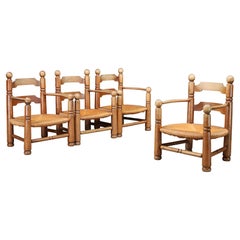 Charles Dudouyt Sculptural Walnut Armchairs with Rush Seats, France 1940s