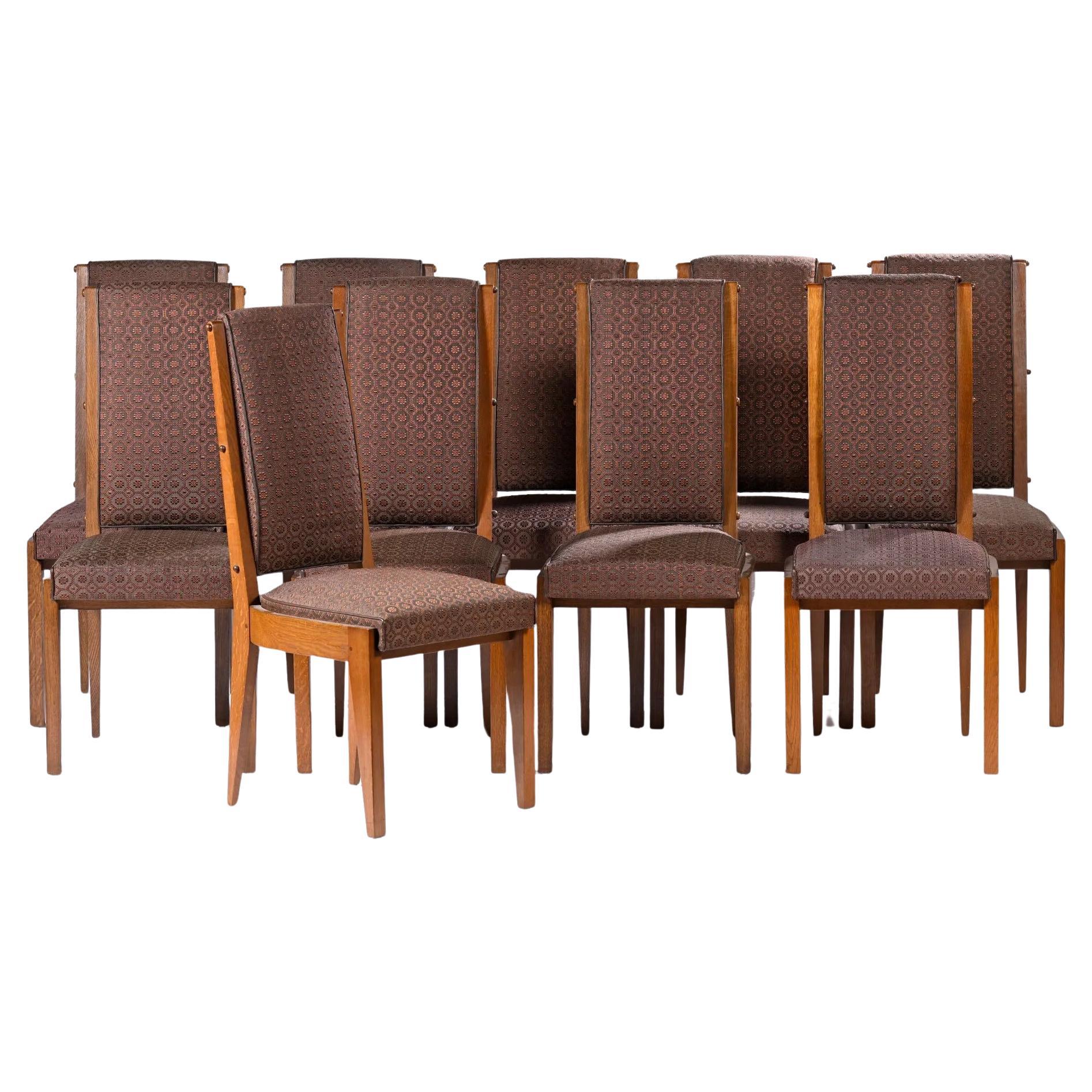 Charles Dudouyt, Set of ten Oak Chairs, circa 1940