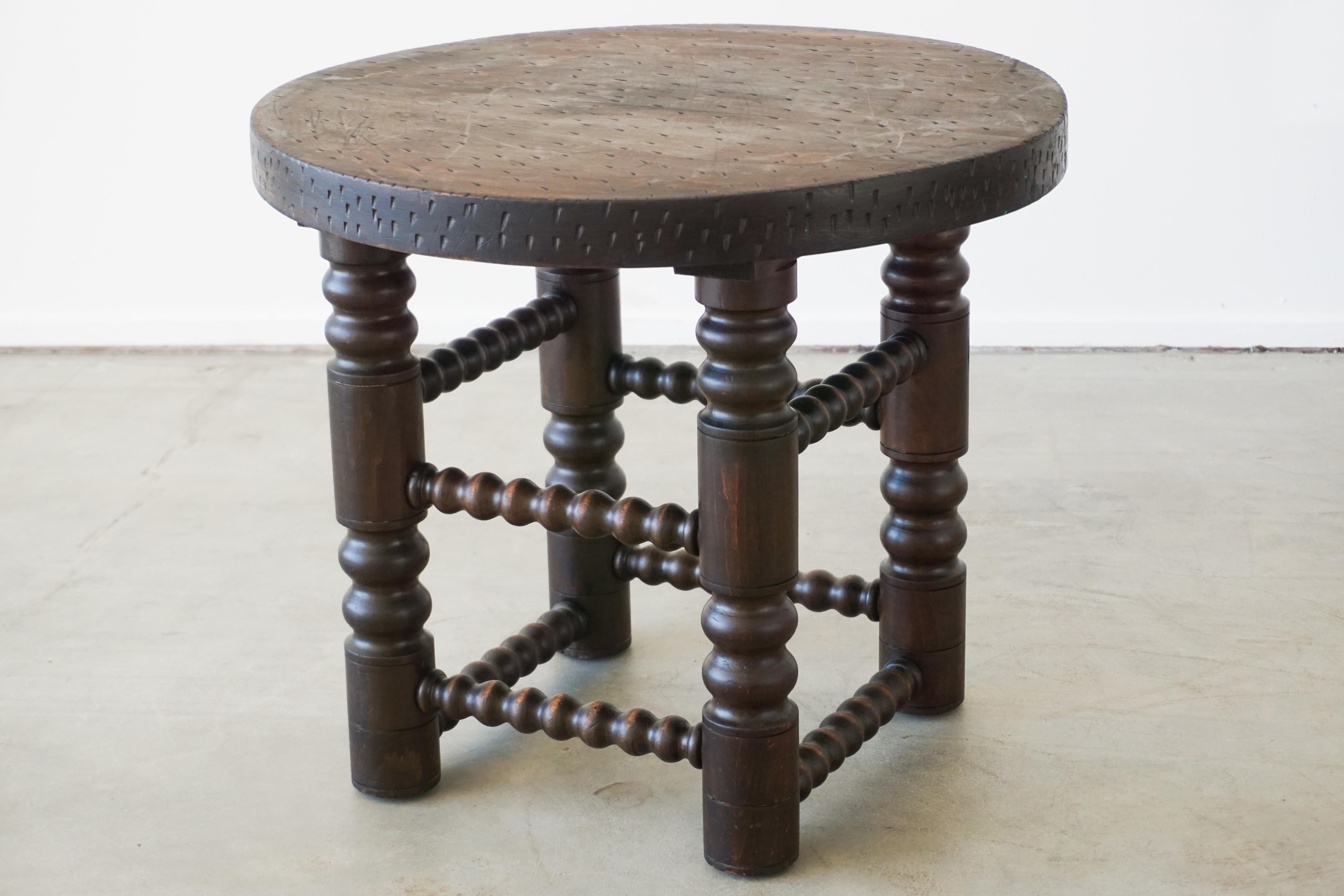 Fantastic rare side table by Charles Dudouyt with four carved wood legs and textured carved oak wood top. 

Wonderful dark patina.