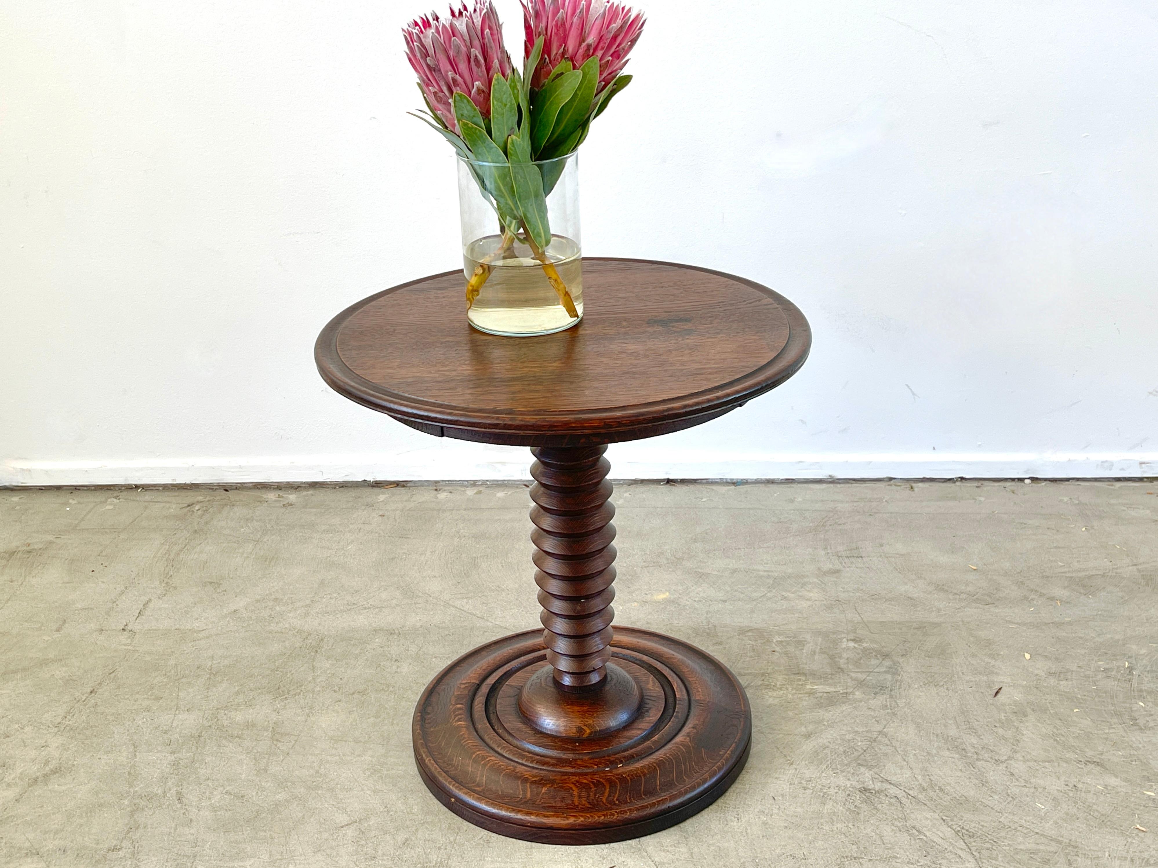 Charles Dudouyt attributed side table with signature cork screw base and concentric circles and wonderful patina