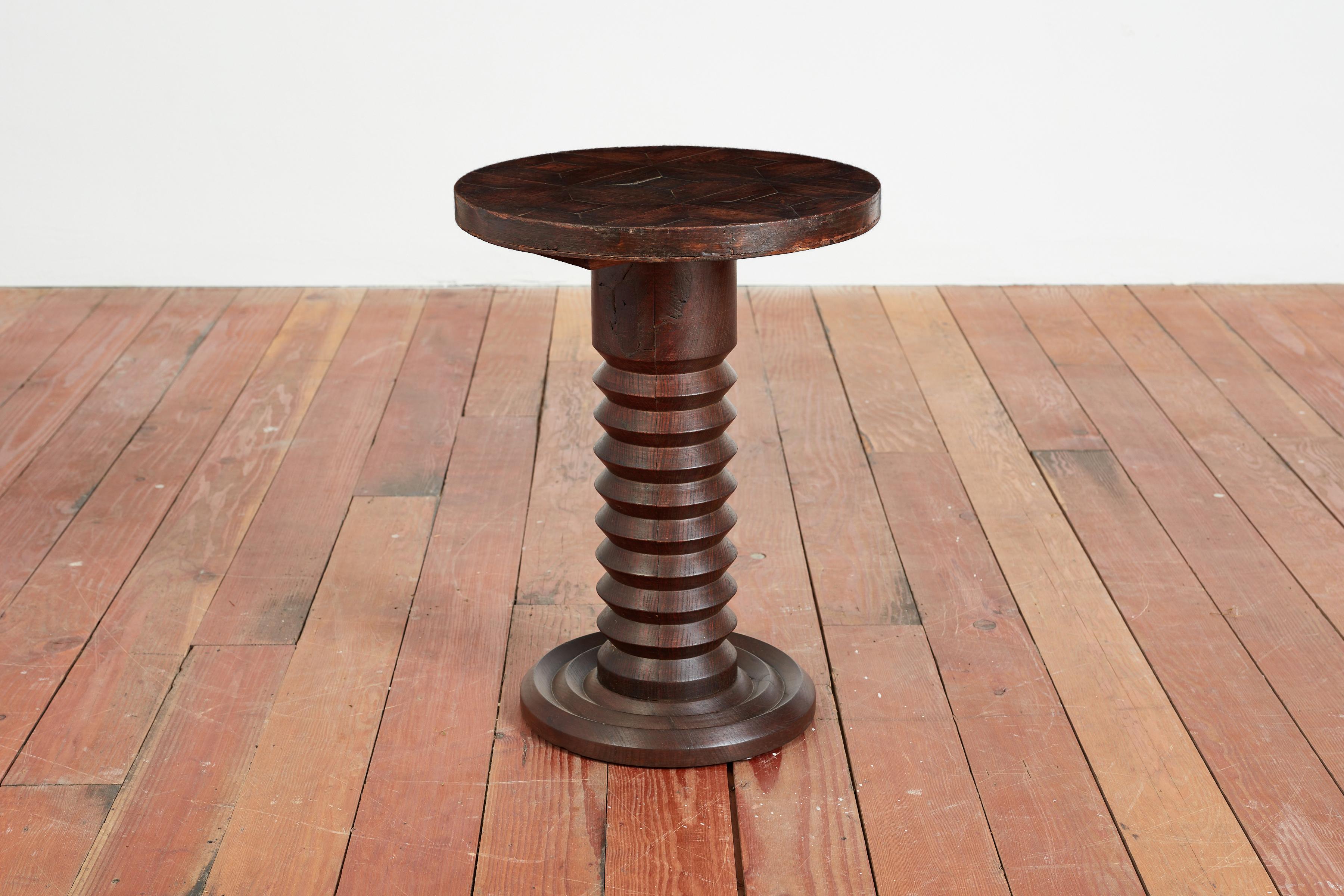 Great sculptural side table attributed to Charles Dudouyt with thick corkscrew base and wonderful parquetry patterned top. 
Wonderful rich dark patina. 



