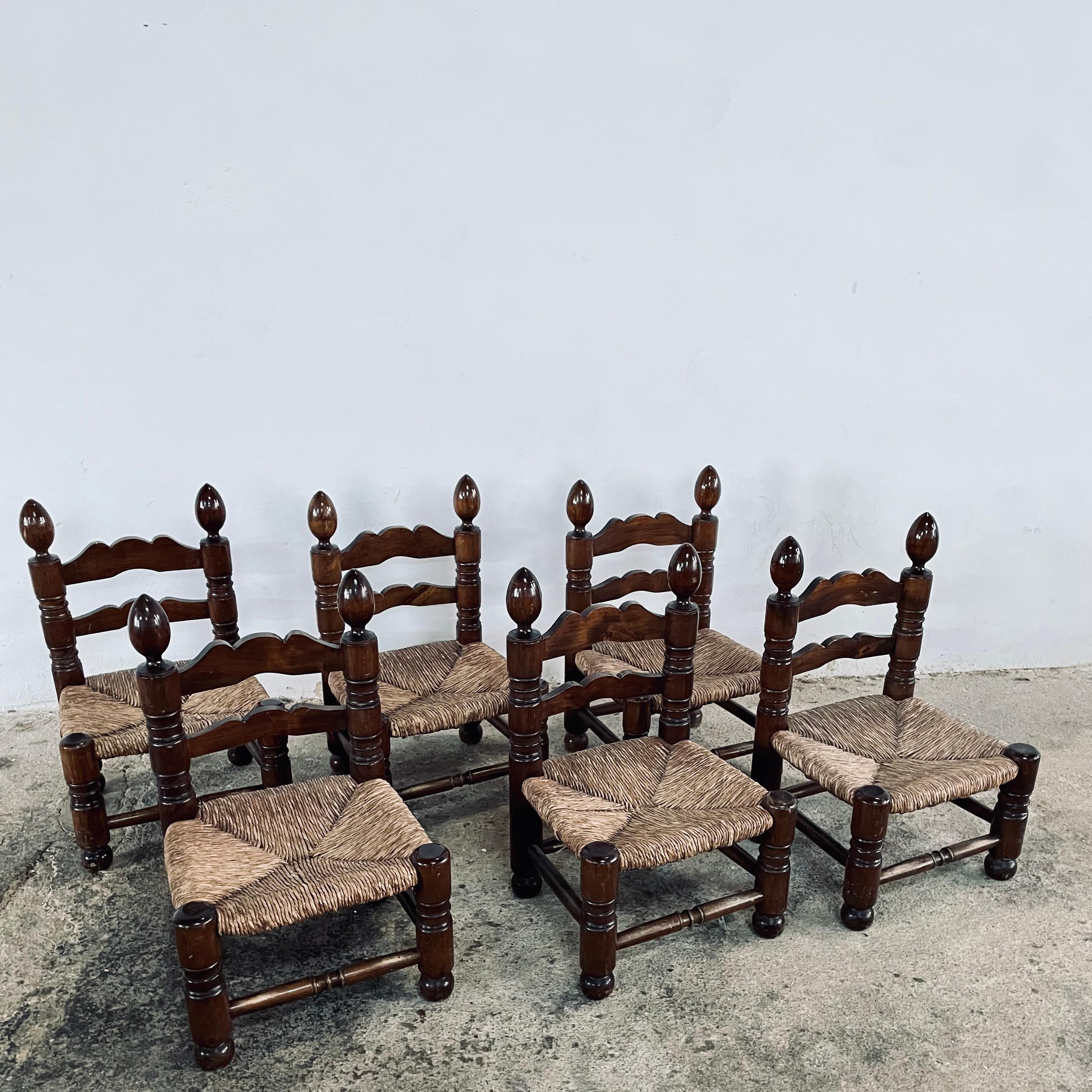 Set of 6, French solid Oak rush seat low lounge chairs attributed to/in the style of Charles Dudouyt, circa 1950s, Perfect for a low seating lounge or beside a fireplace, this vintage item remains fully functional, it shows sign of age through