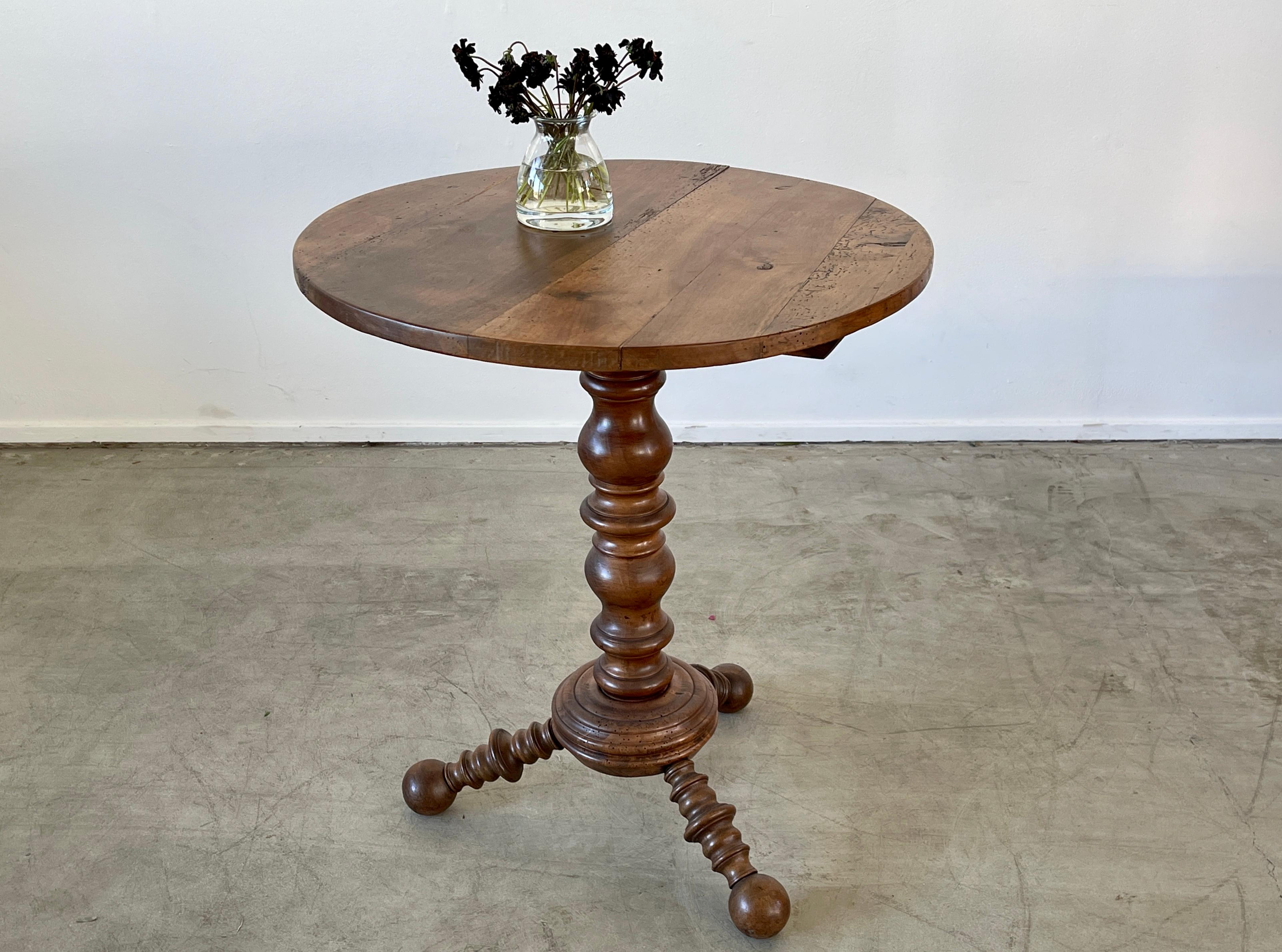 French tripod table in the style of Charles Duduouyt with carved base
Great patina to wood.