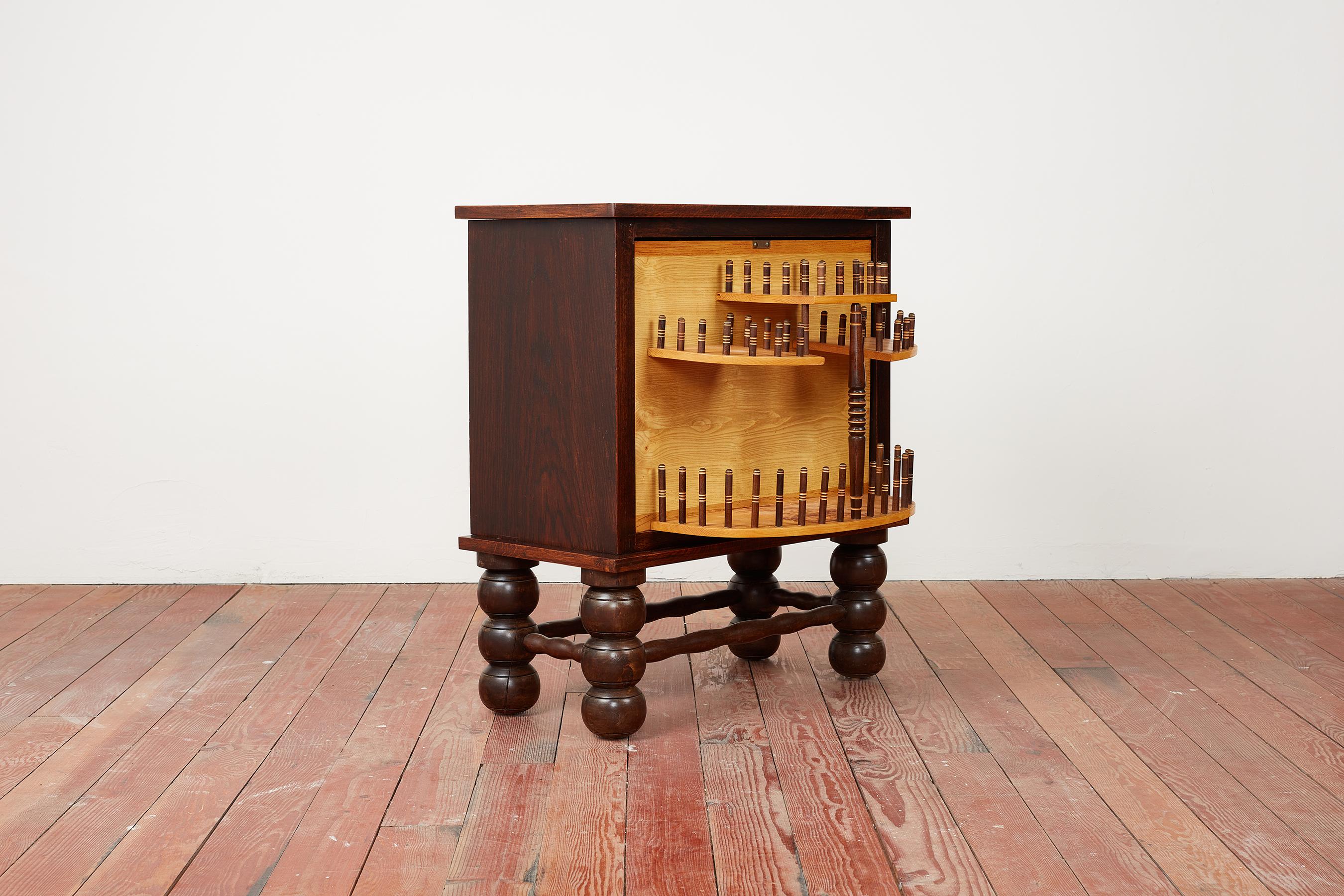 Mid-20th Century Charles Dudouyt Swivel Bar Cabinet For Sale