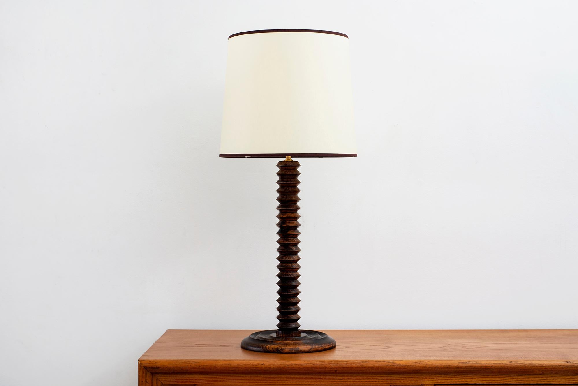 Charles Dudouyt table lamp with signature corkscrew shape - 
Wonderful patina to oak
Newly rewired and new shade. 

Shade diameter - 14