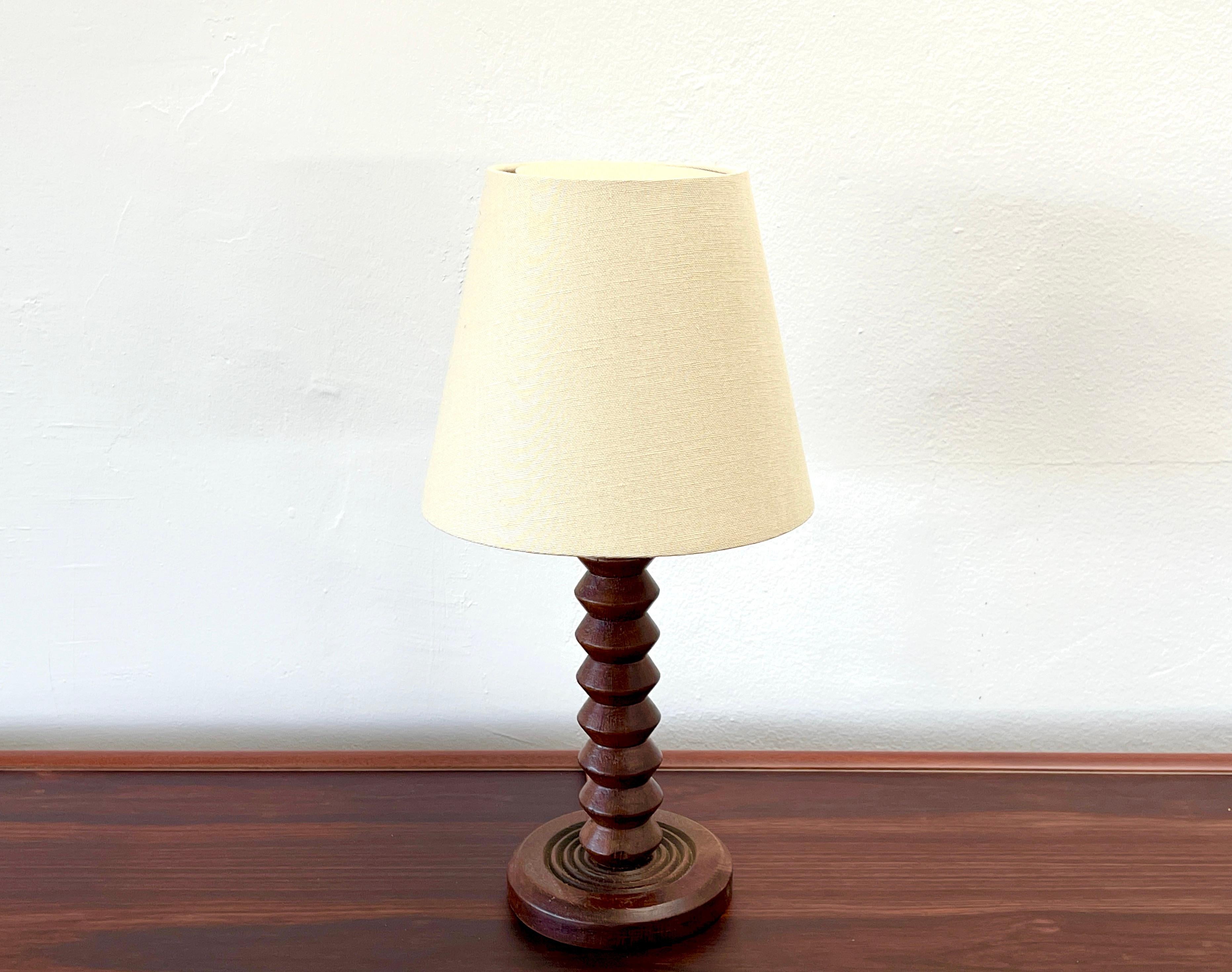 Charles Dudouyt table lamp with chunky corkscrew base and new linen shade.