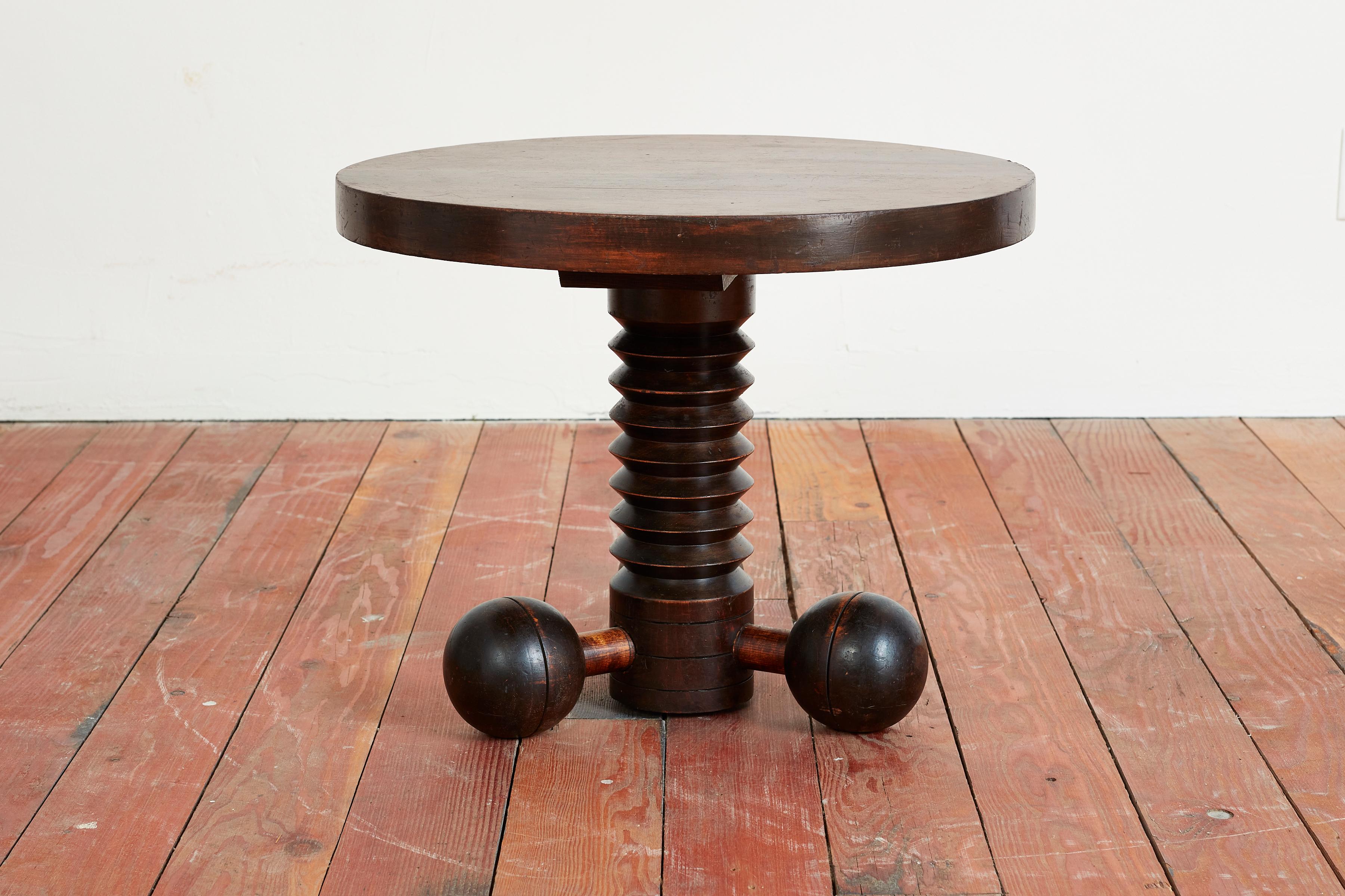 Great sculptural side table by Charles Dudouyt with three wooden balled feet and signature carved corkscrew base.

Wonderful patina throughout.

Incredible and hard to find piece!
