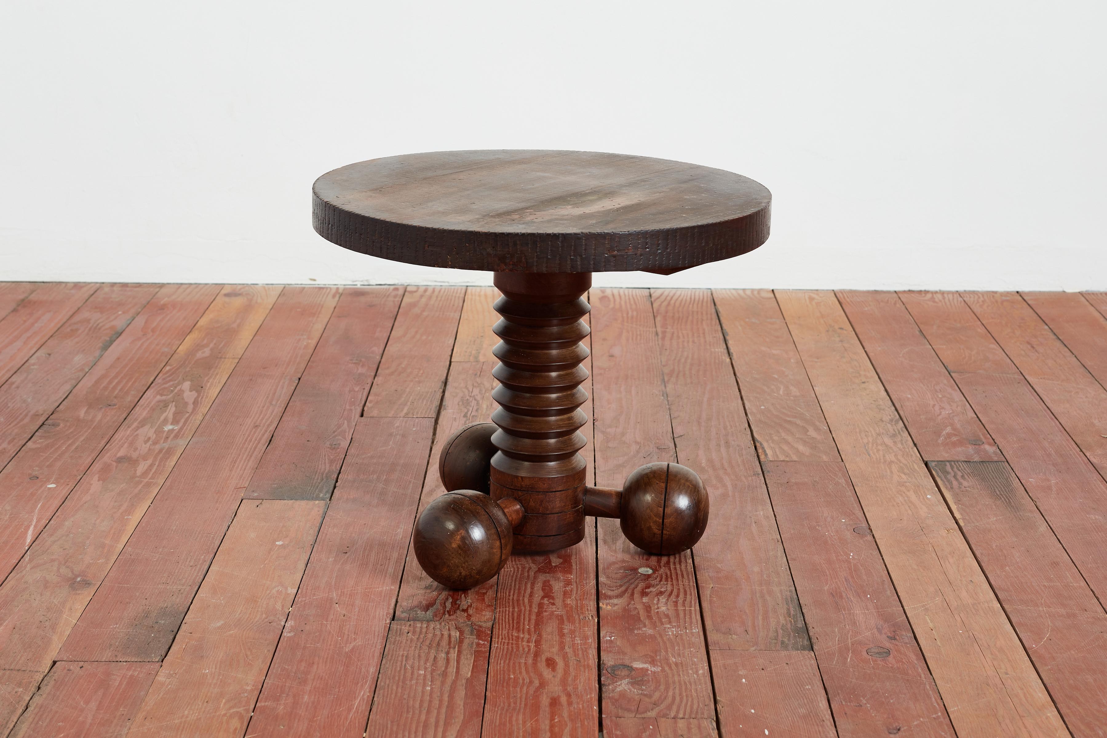 Great sculptural side table by Charles Dudouyt with three wooden balled feet and signature carved corkscrew base. 

Wonderful rich wood patina throughout.