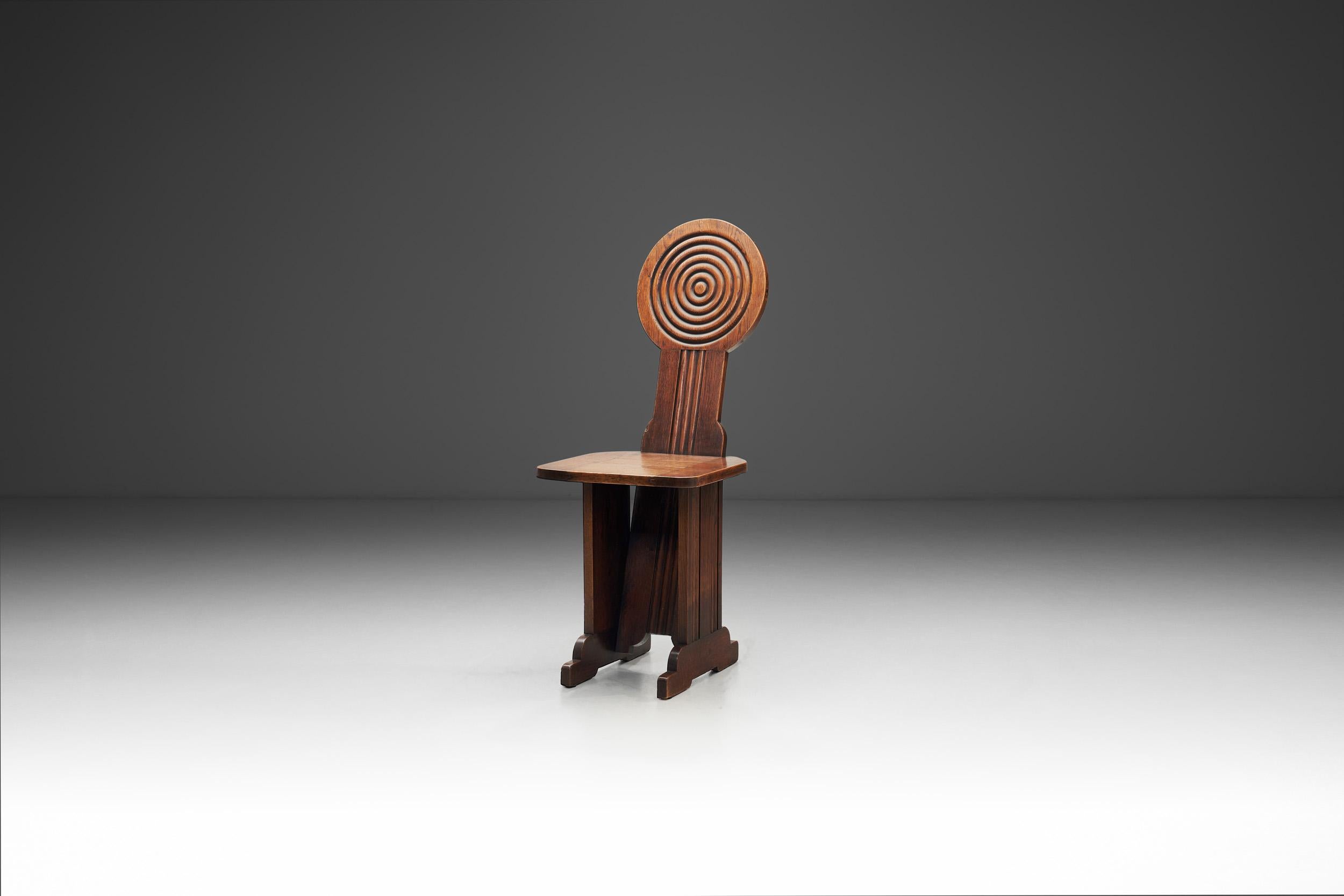 Charles Dudouyt's work was characterised by its simplicity and the use of natural materials, such as oak, beech, and walnut. He favoured simple, geometric forms and often incorporated decorative elements, such as inlaid marquetry or carved