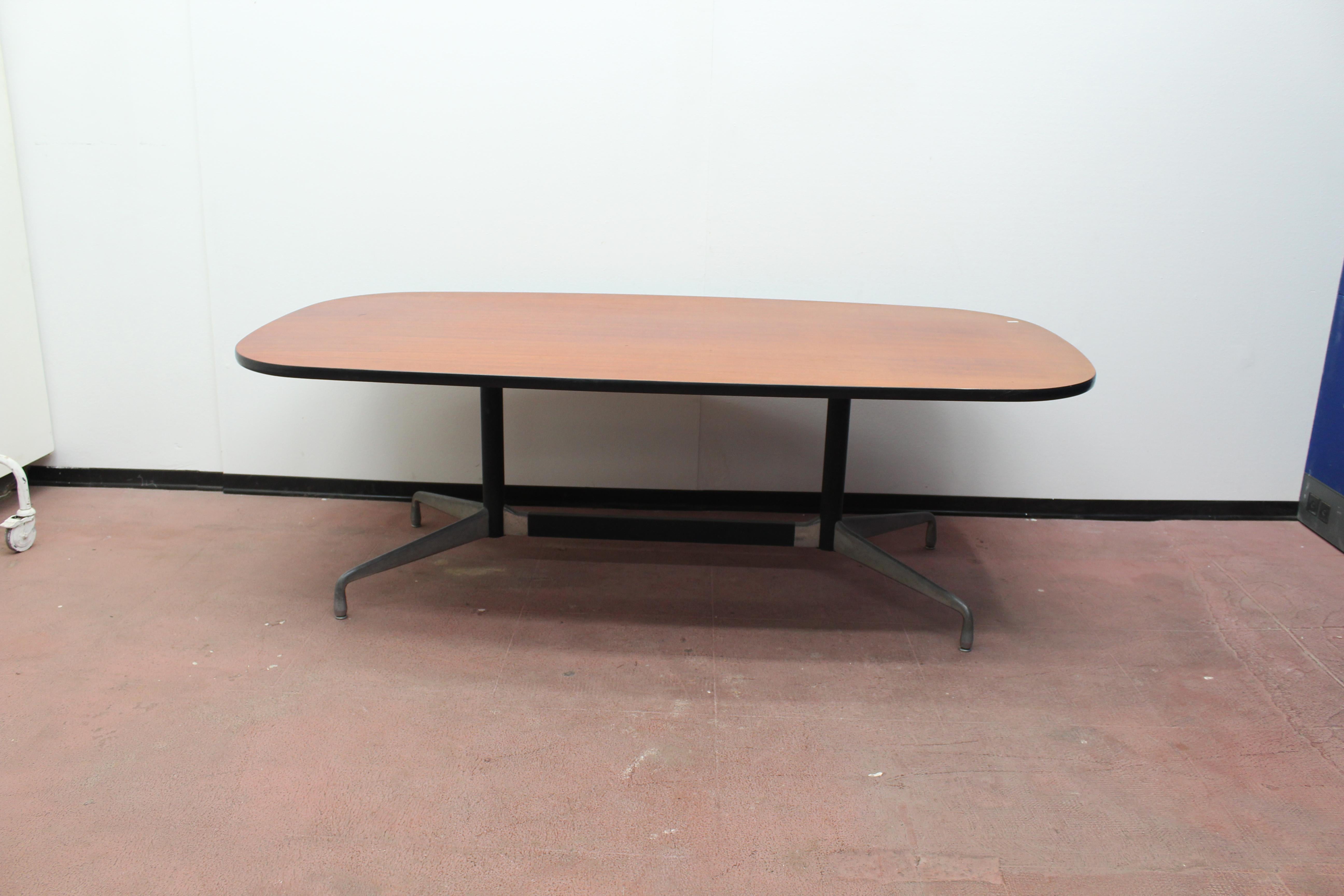 Model Segmented conference table with ashwood top, designed by Charles Eames for Herman Miller in 1964. With very simple and clean design lines, this table can be inserted into any furniture.
Wear consistent with age and use.
 