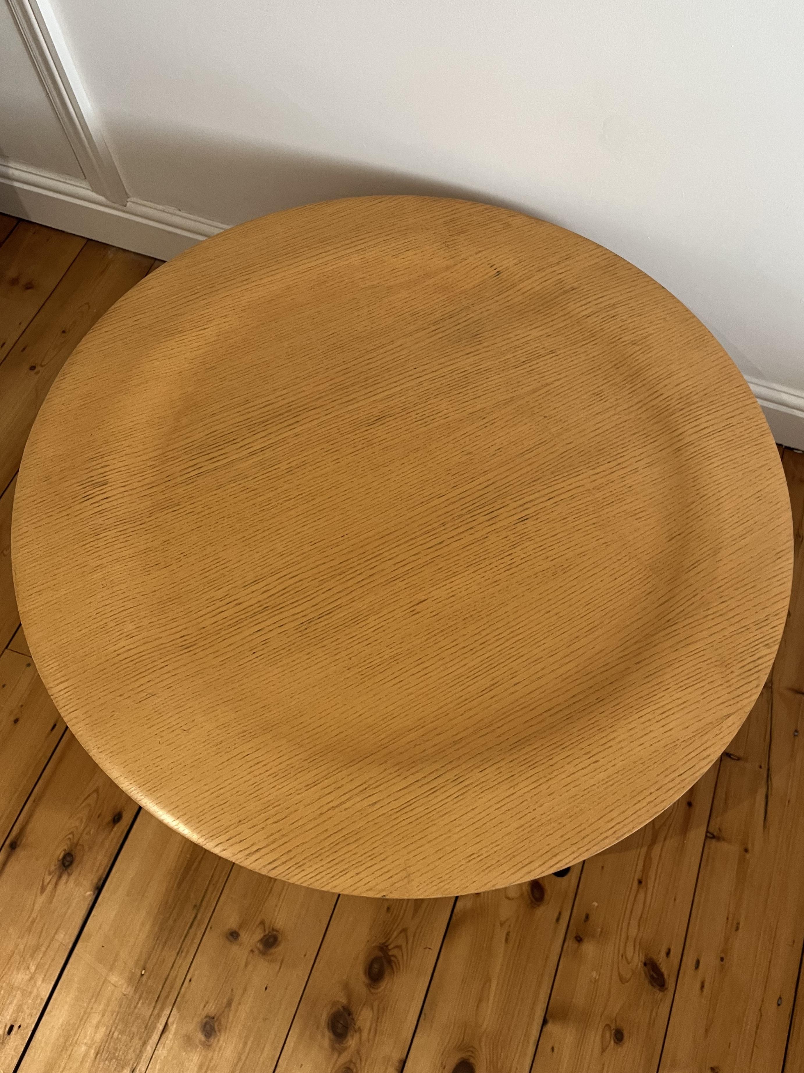 The Eames CTM (coffee table metal) is part of the plywood group of furniture and was designed by Charles and Ray Eames in 1945.

The circular table with raised edges has a natural ash top with chrome legs.

The table is in good condition just