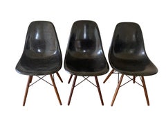 Charles Eames DSW dining chairs in black fiberglass by Herman Miller 1970s