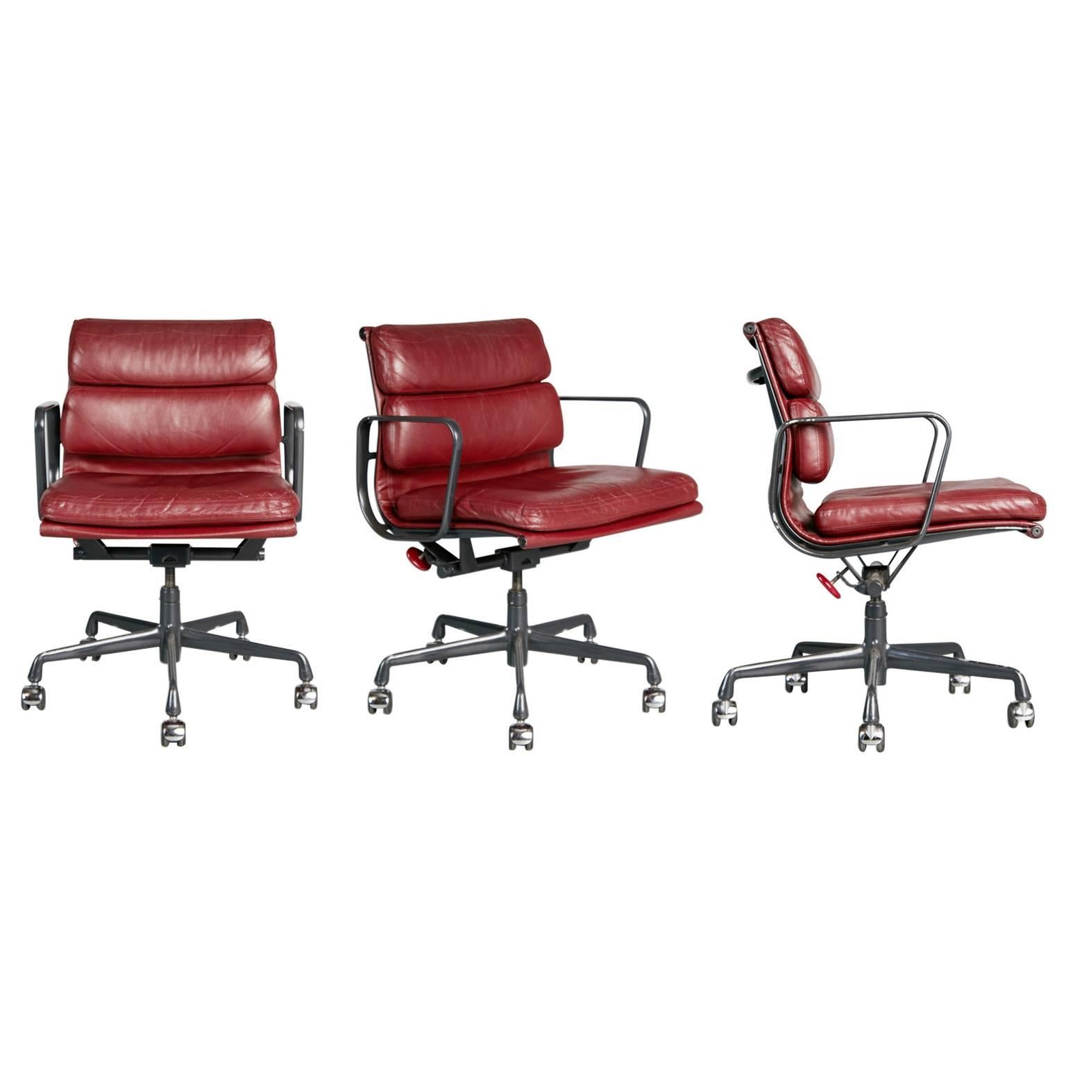Charles Eames for Herman Miller Burgundy Soft Pad Management Chairs, circa 1980