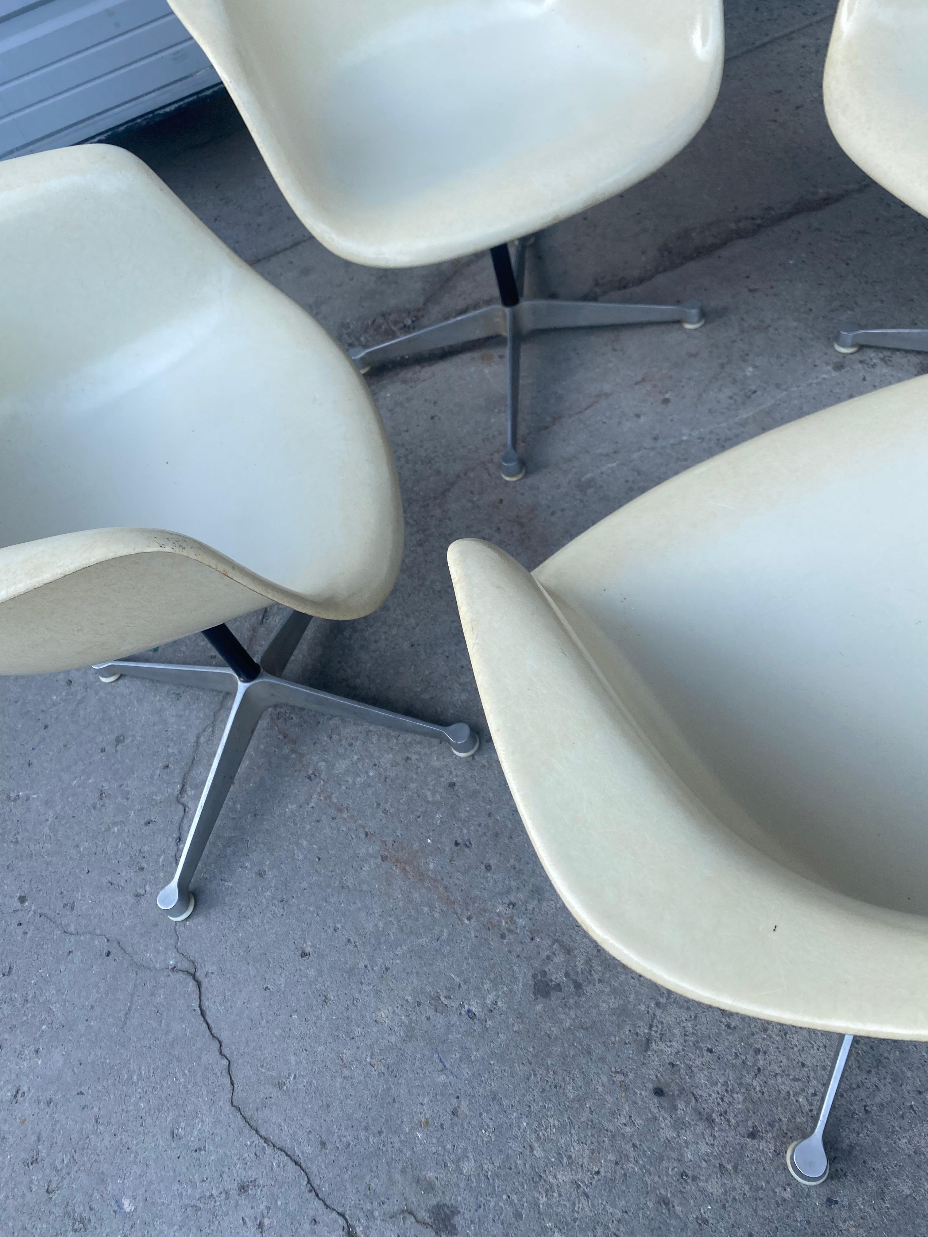  iconic design classic from the Mid-Century Modern period. This vintage fiberglass shell chair was designed by Charles Eames and produced by Herman Miller, 1960s,,, Amazing original condition,,. Classic ,,elegant white  These chairs are sold with