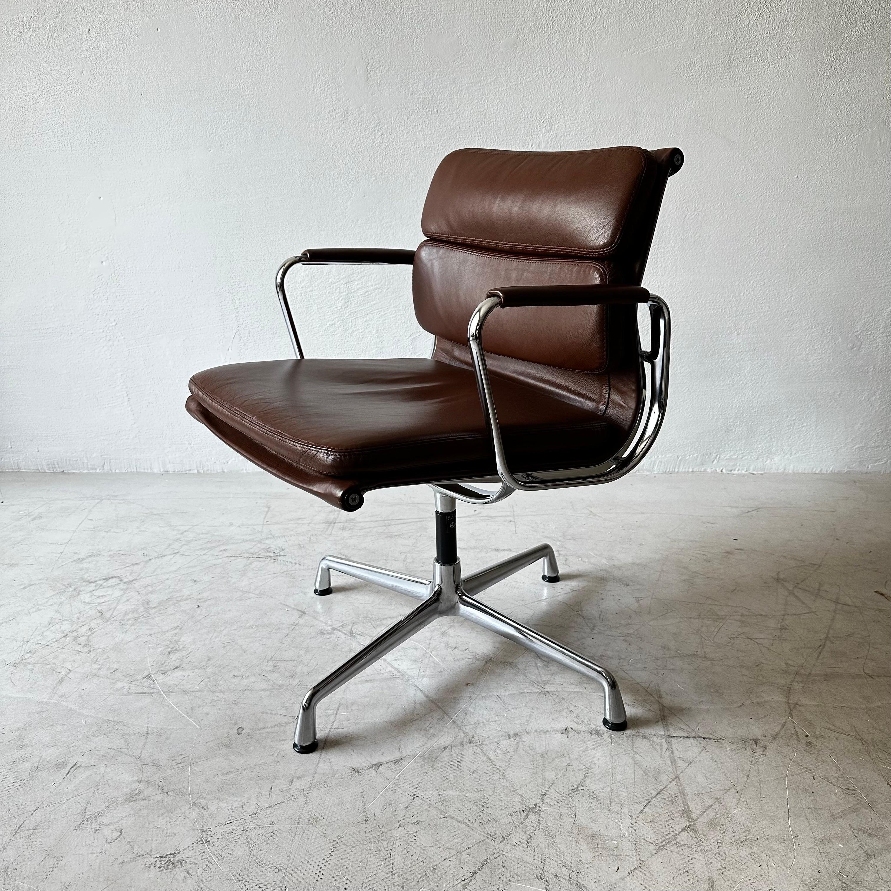 Rare set of 10 Soft Pad chairs EA208 by Charles Eames in dark cognac leather and chromed metal.
Vitra label and mark on the base. Height 84cm. In very good vintage condition.

Good looking and super comfortable office or dining chairs. This is