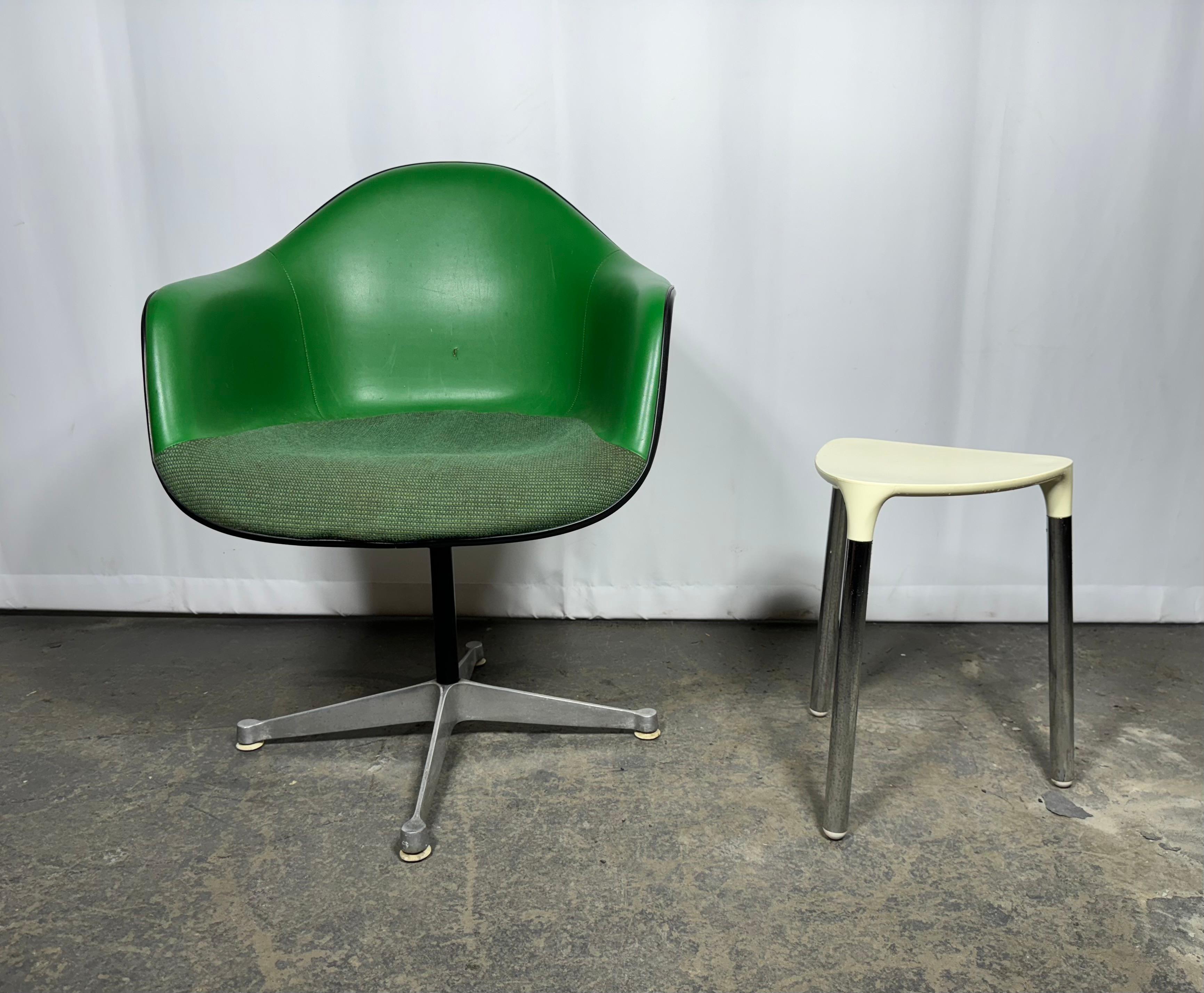 Unusual Charles Eames / Herman Miller / Girard  Padded Arm Shell Swivel Aluminum Base.. White fiberglass shell with amazing green naugahyde and Alexander Girard fabric seat. small hole to naugahyde (see photo). Retains Herman Miller incised stamp.: