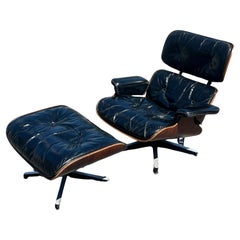 Silla y otomana Charles Eames Herman Miller, años 60