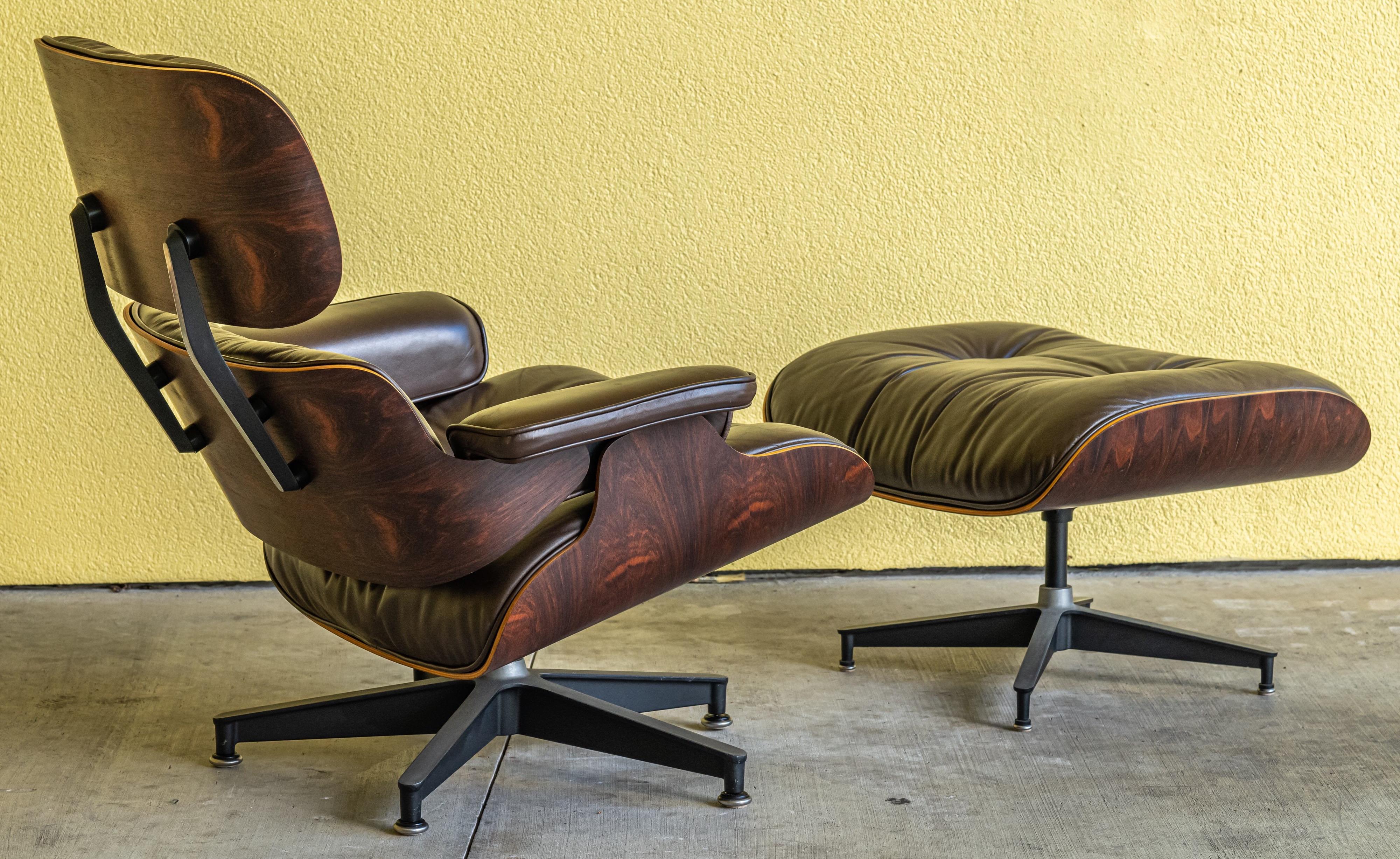 Charles Eames for Herman Miller lounge chair and ottoman. One owner. Original brown leather in very good condition with no tears, cracks or discolorations. Extraordinary pattern on the veneer on both pieces. All labels present.