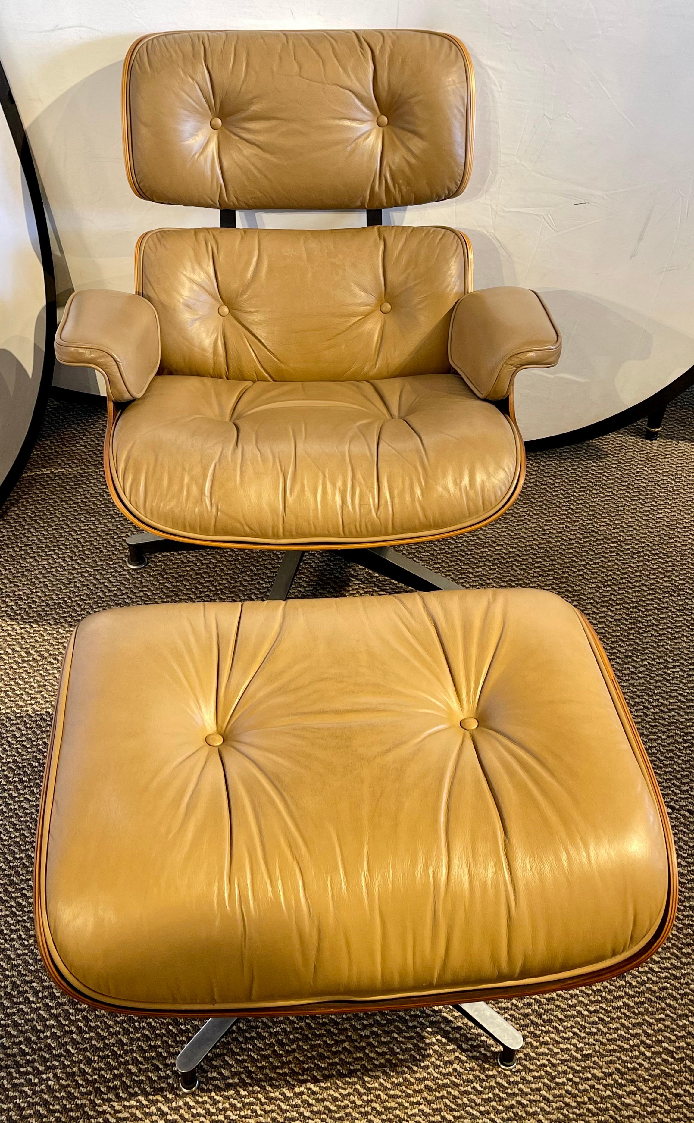 Charles Eames, Herman Miller Mid-Century Modern chair & ottoman. A stunning example of Eames Miller style and grace from the Mid-Century Modern era. This rosewood framed chair has its original leather upholstery that is so slightly worn that it is