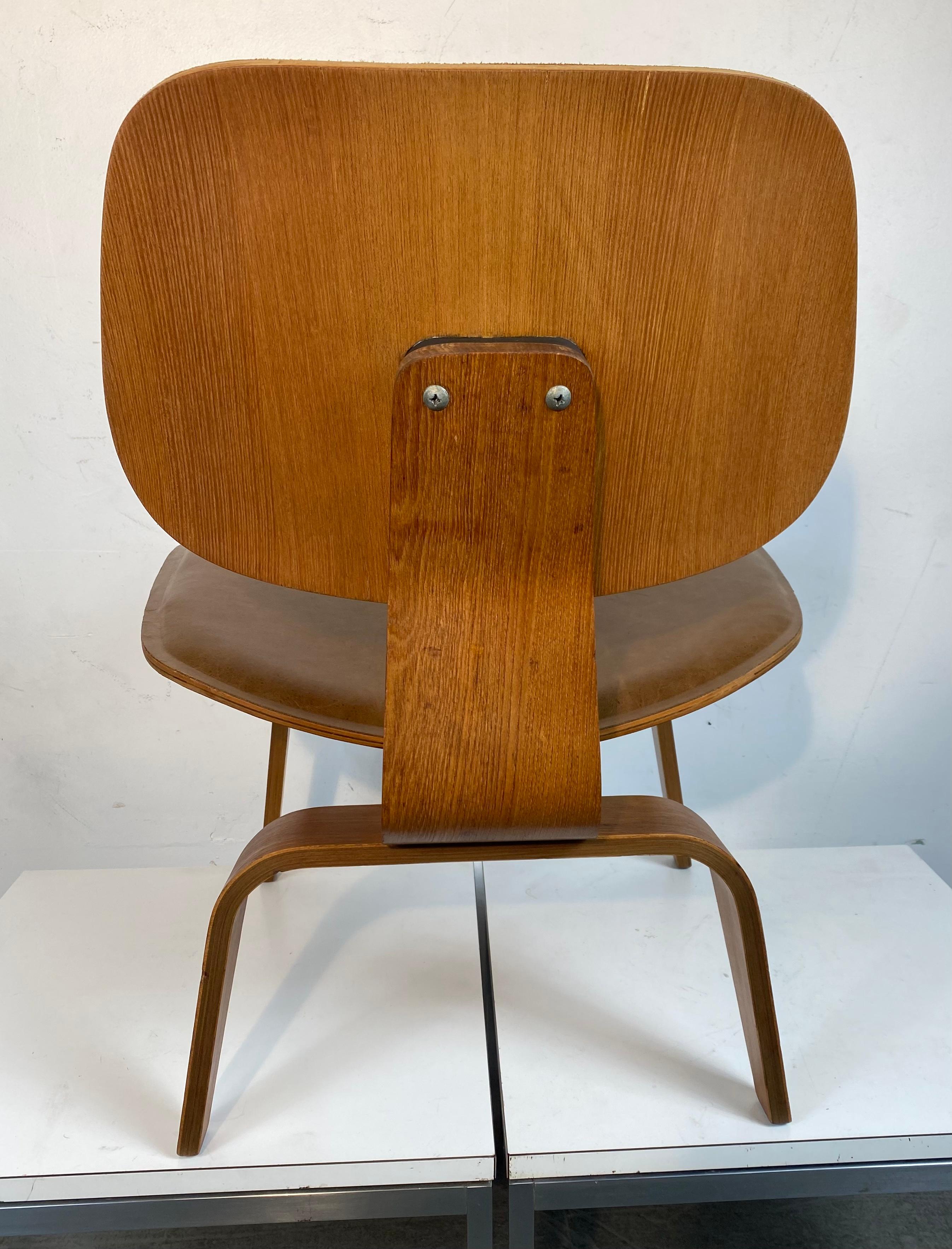 Mid-Century Modern Charles Eames L C W (LOUNGE CHAIR) Leather seat and back, Modernist Herman Miller