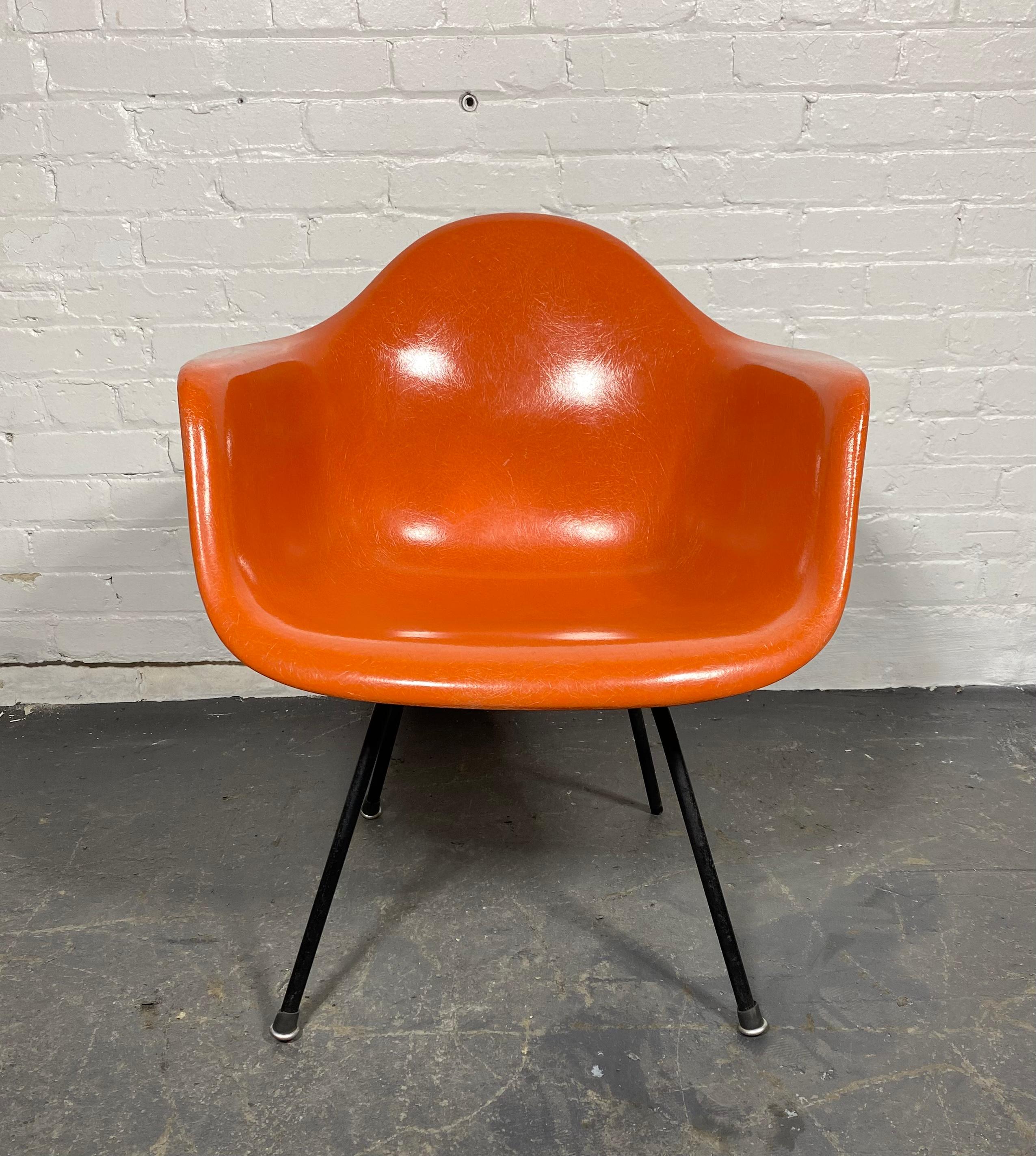 Classic Charles Eames for Herman Miller   LAX Fiberglass Lounge Height Arm Shell Chair /  Retains stunning gel coat  with Exposed Fibers.. Amazing color, very good condition,, Extremely comfortable.Perfect addition to your Modernist, contemporary.