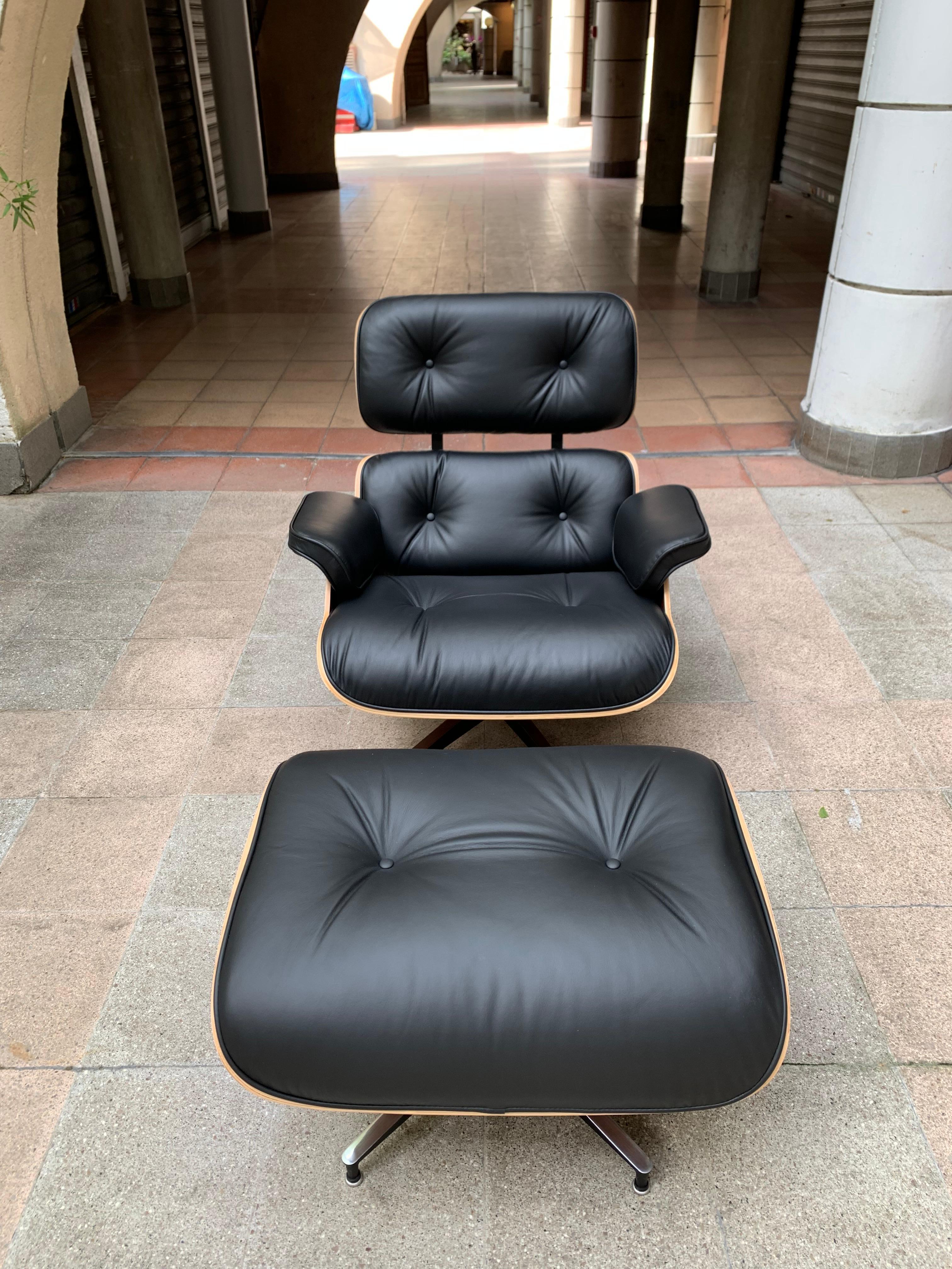American Charles Eames, Lounge Chair and Its Black Leather and Rosewood Ottoman, 2011