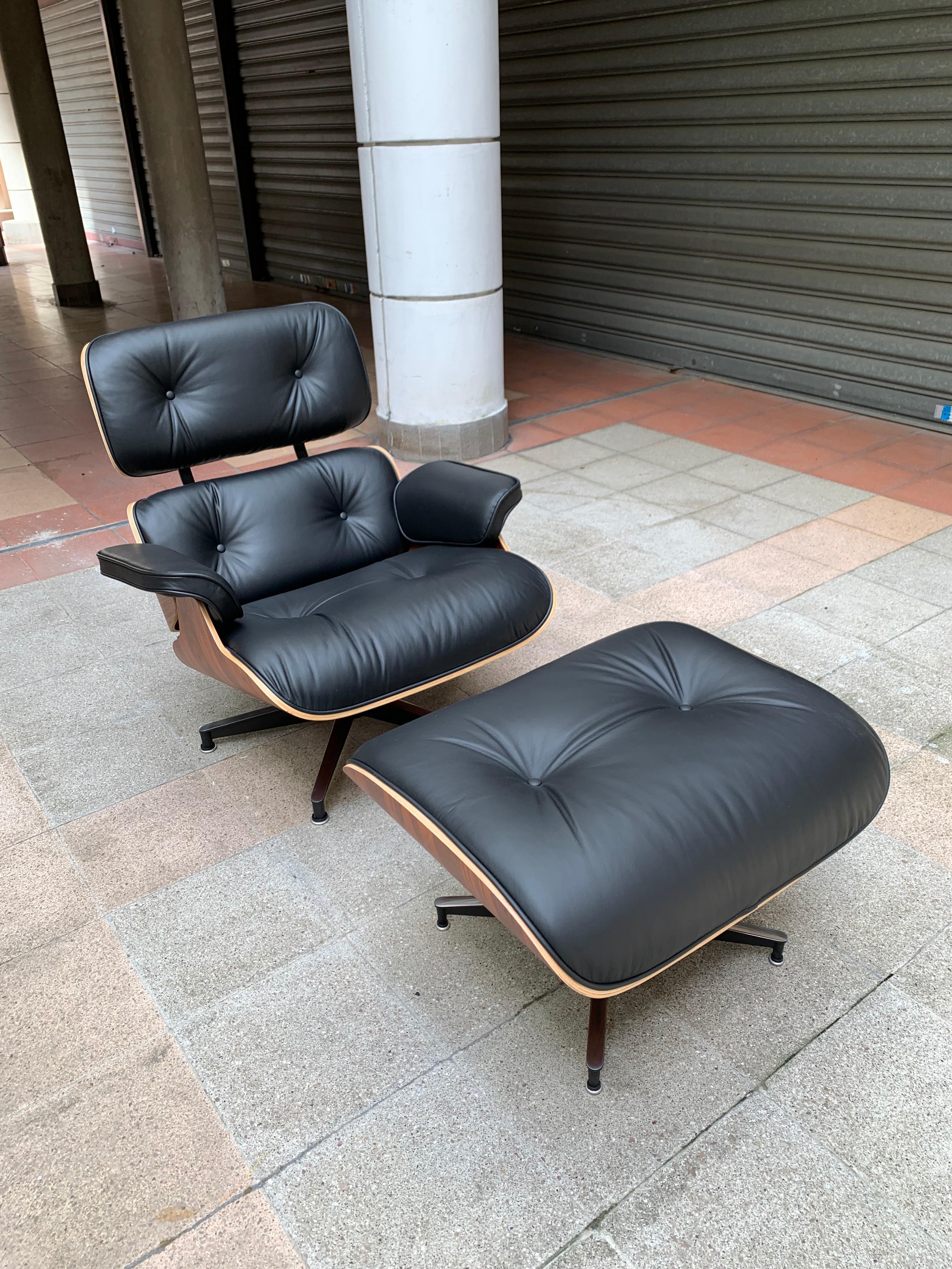 American Charles Eames, Lounge Chair and Its Black Leather and Rosewood Ottoman, 2011