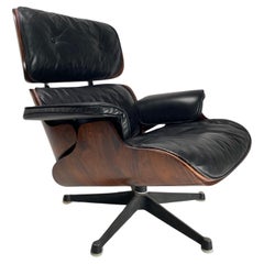 Charles Eames, Lounge Chair in black leather by Herman Miller