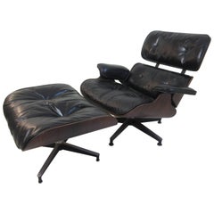 Charles Eames Rosewood for Herman Miller Lounge and Ottoman with Down Cushions