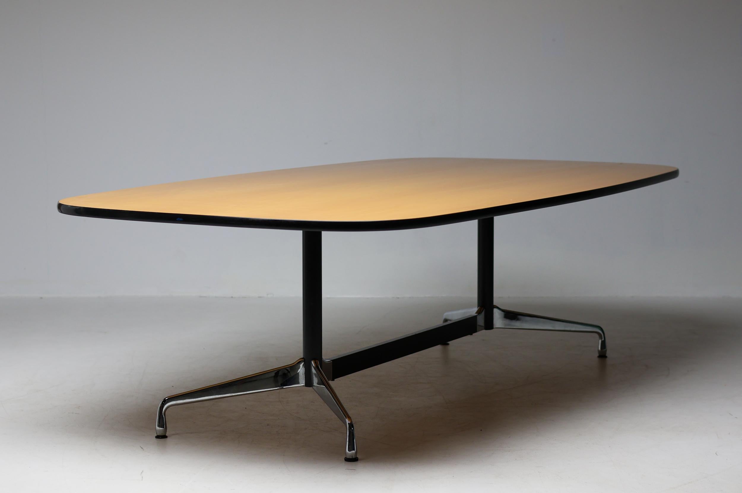 Large Charles & Ray Eames Segmented Base conference table manufactured by Vitra in 2001.
Beautiful beech book matched veneer one piece tabletop, marked with production date label.
The base marked with a Vitra label as shown.
Sparingly used in a