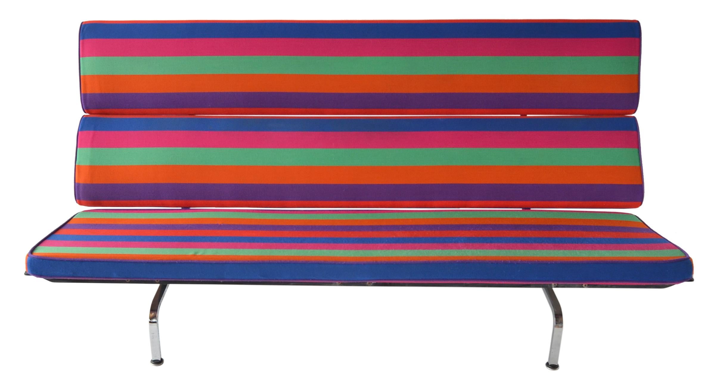 A very rare and rather exceptional sofa compact by Charles Eames for Herman Miller. 
This example is special for a few reasons. 

It is a very early model as evidenced by the centre metal bracket. It is also a folding example. Later pieces were