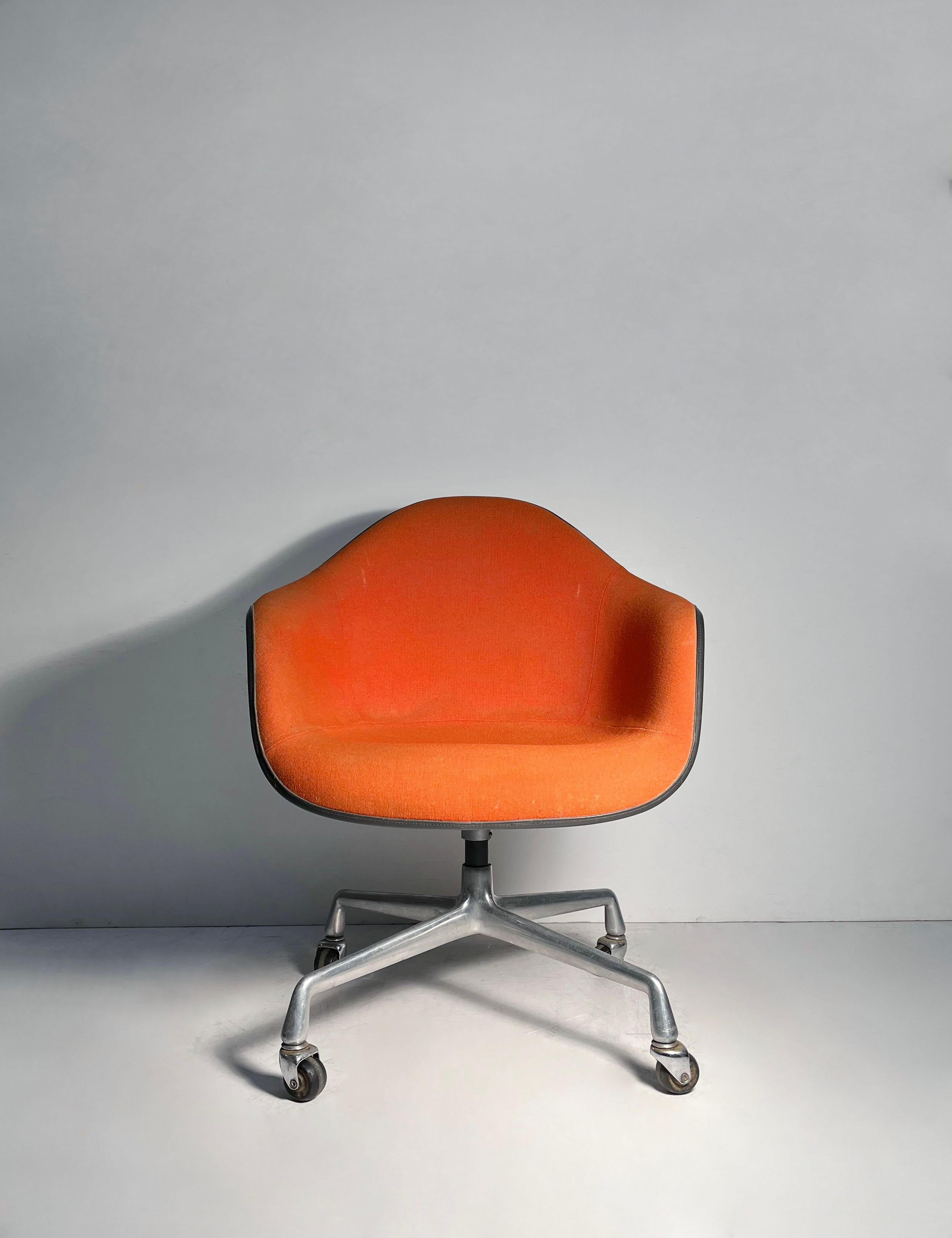 Charles Eames Vintage Orange Upholstered Swivel Chair (Height Adjustable)

Will confirm dims.  Please contact for additional photos and Dealer Shipping Quote.