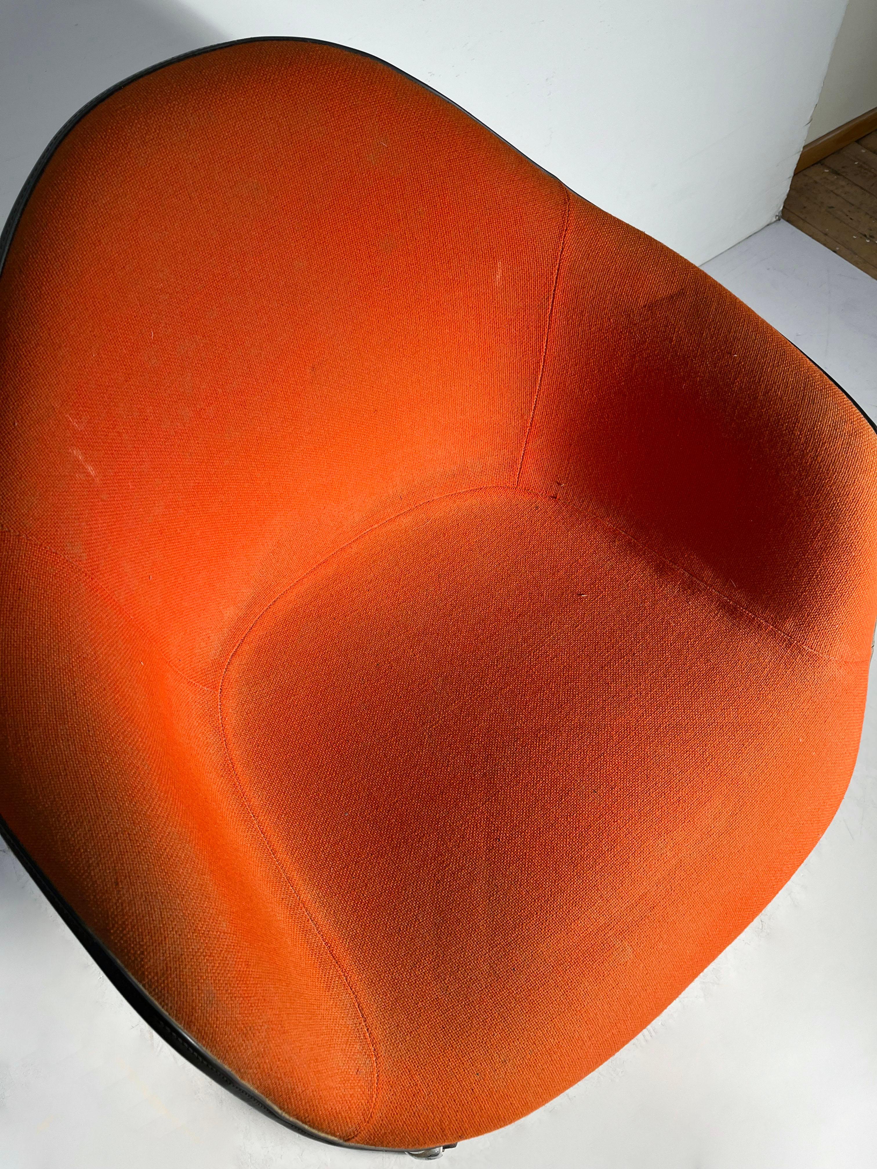 Charles Eames Vintage Orange Upholstered Swivel Chair In Good Condition For Sale In Chicago, IL