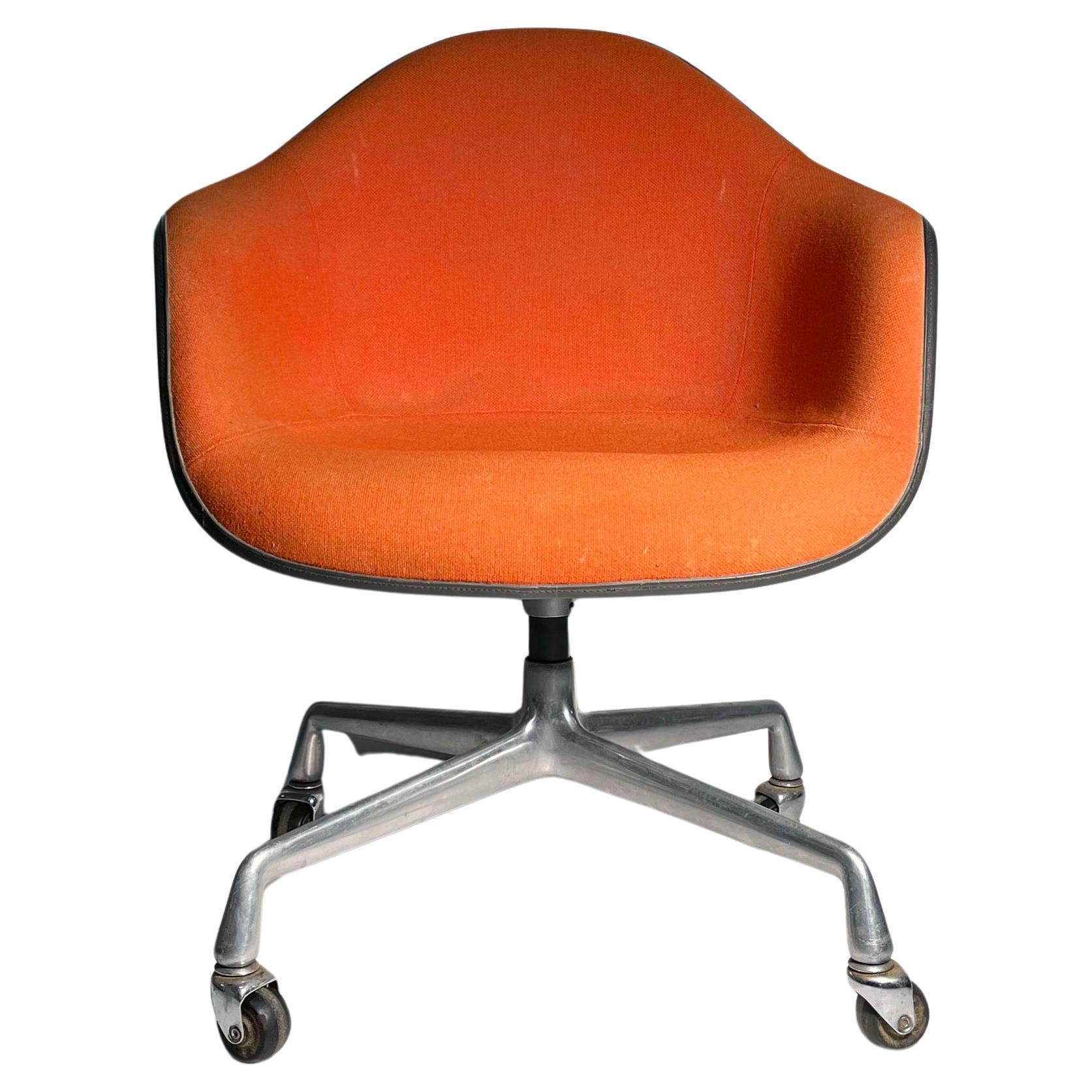 Charles Eames Vintage Orange Upholstered Swivel Chair For Sale