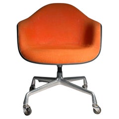 Charles Eames Vintage Orange Upholstered Swivel Chair