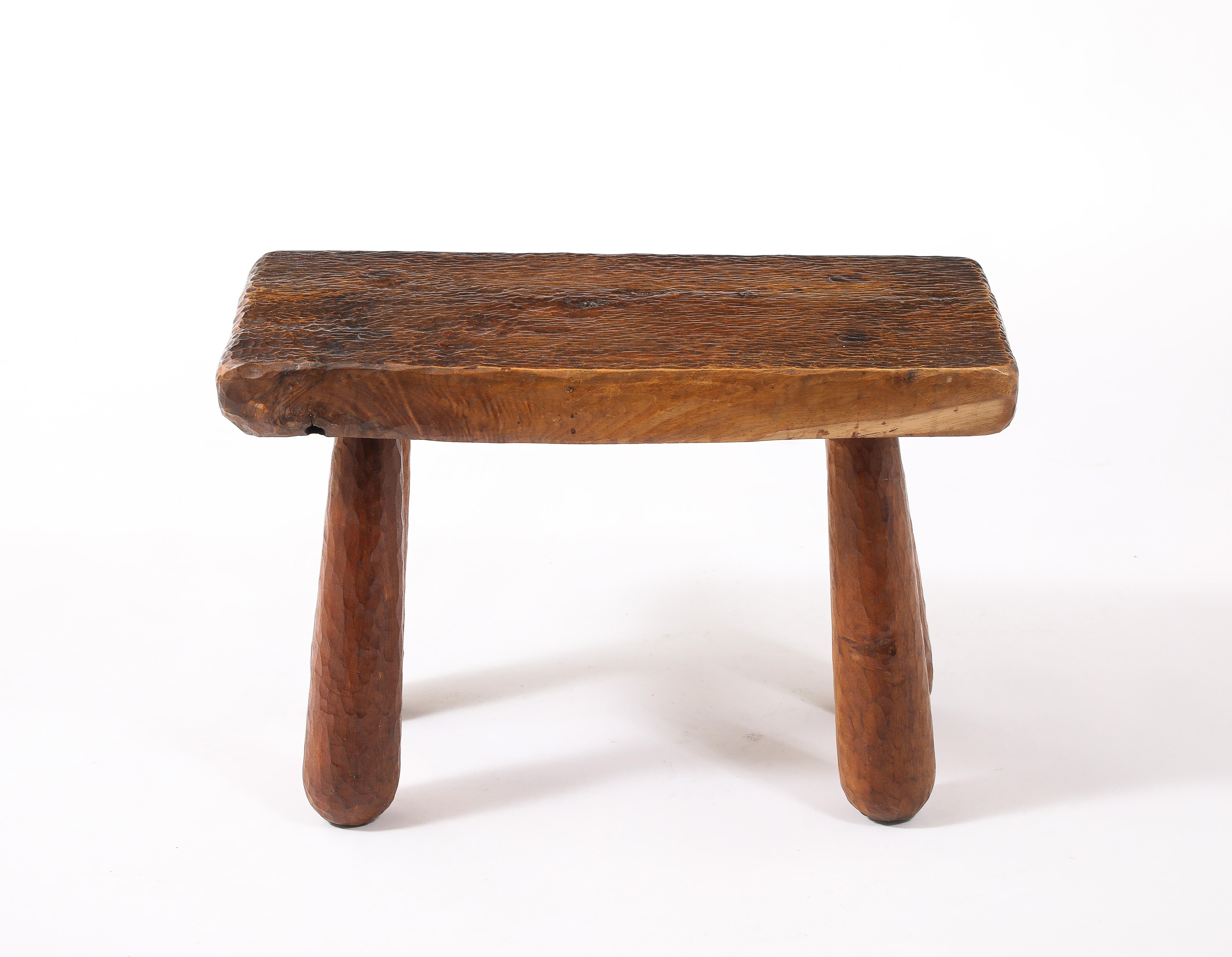 End table in solid carved elm, it’s surface is entirely hand gouged. Cipher to underside.
