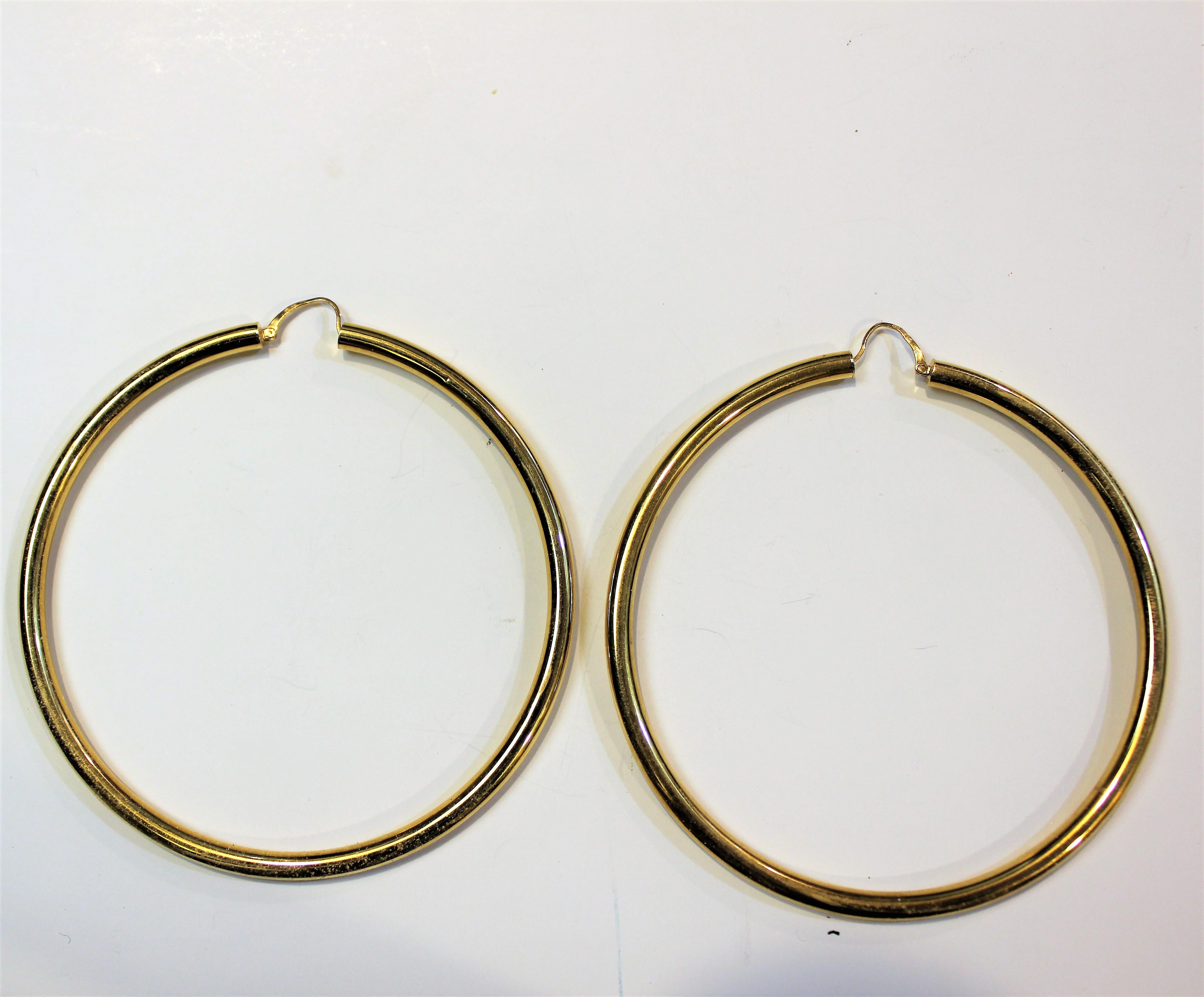 This is one of many Charles Garnier from Paris,  18 karat yellow gold hollow hoop earrings.
This collection is from a close out store with its left over stock still in the safe.
Circa 1980-90's
This designs are extremely detailed with light weight