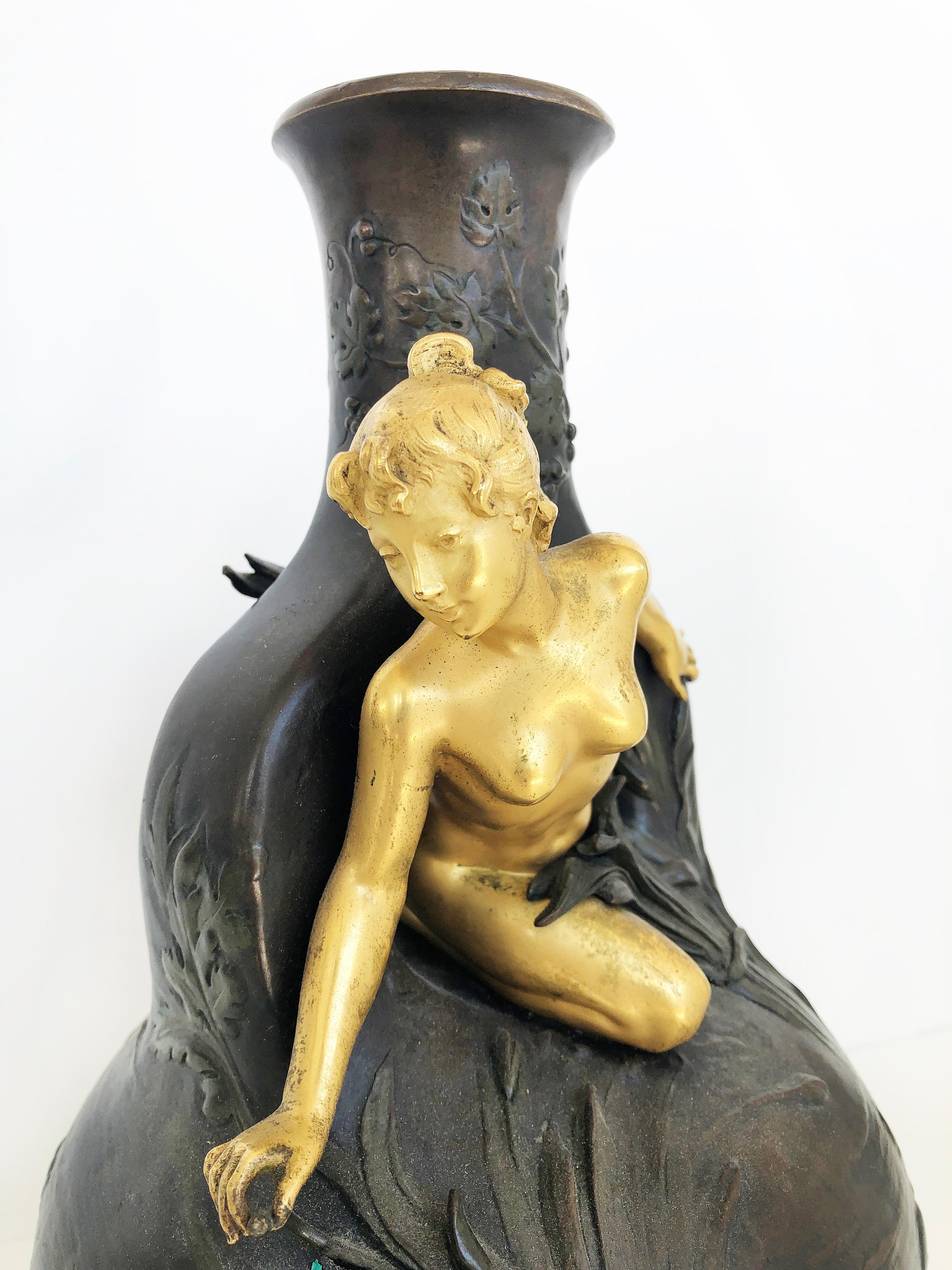 Charles Georges Ferville-Suan Art Nouveau bronze vase sculpture

Offered for sale is a Charles Georges Ferville-Suan (French, 1847-1925) bronze sculpture vase depicting a nude maiden nymph coming out of the water between large leaves. This is a