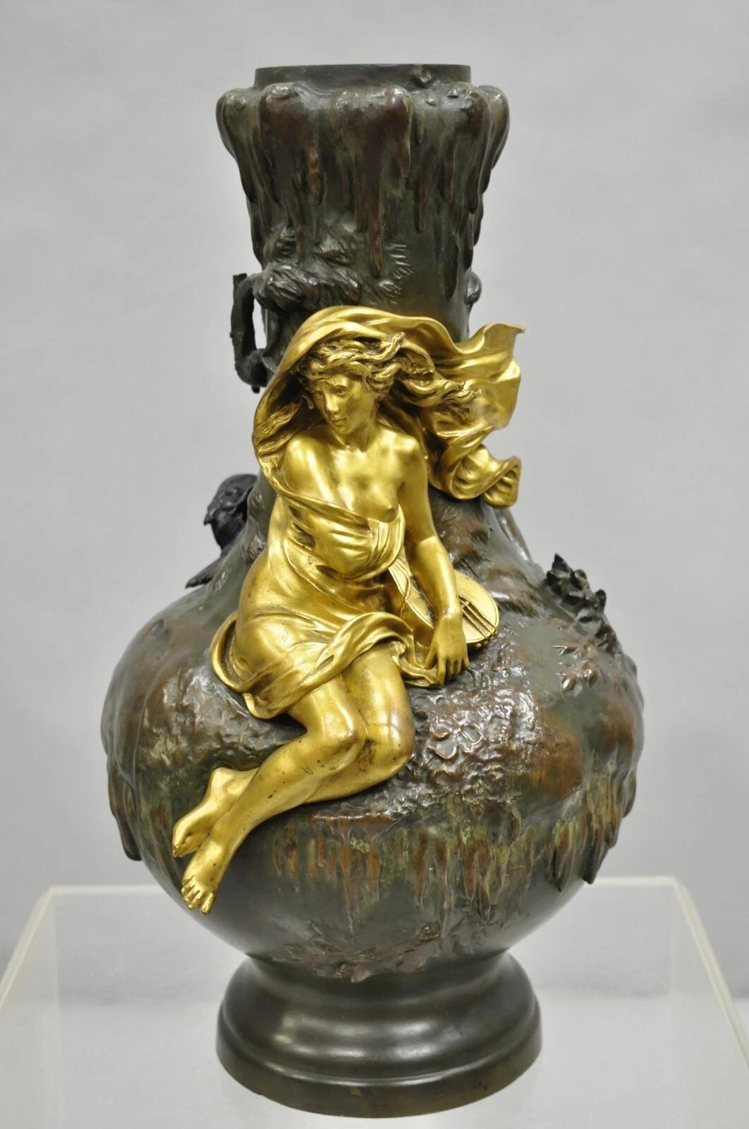 Antique Charles Georges Ferville-Suan (1847-1925) French Art Nouveau Gold Gilt Patinated Bronze Sculpture Vase. Item features a gold gilt bronze figure of a woman musician, birds, branches and vines, removable bud vase insert, original signatures,