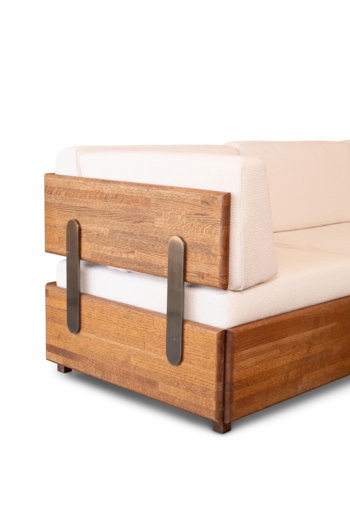 Charles Gibilterra solid oak and bronze sectional, circa early 1970s. This seldom seen example has been newly upholstered in a Herman Miller boucle. Width measurement is from corner to corner one diagonal. Each sofa section measures 92