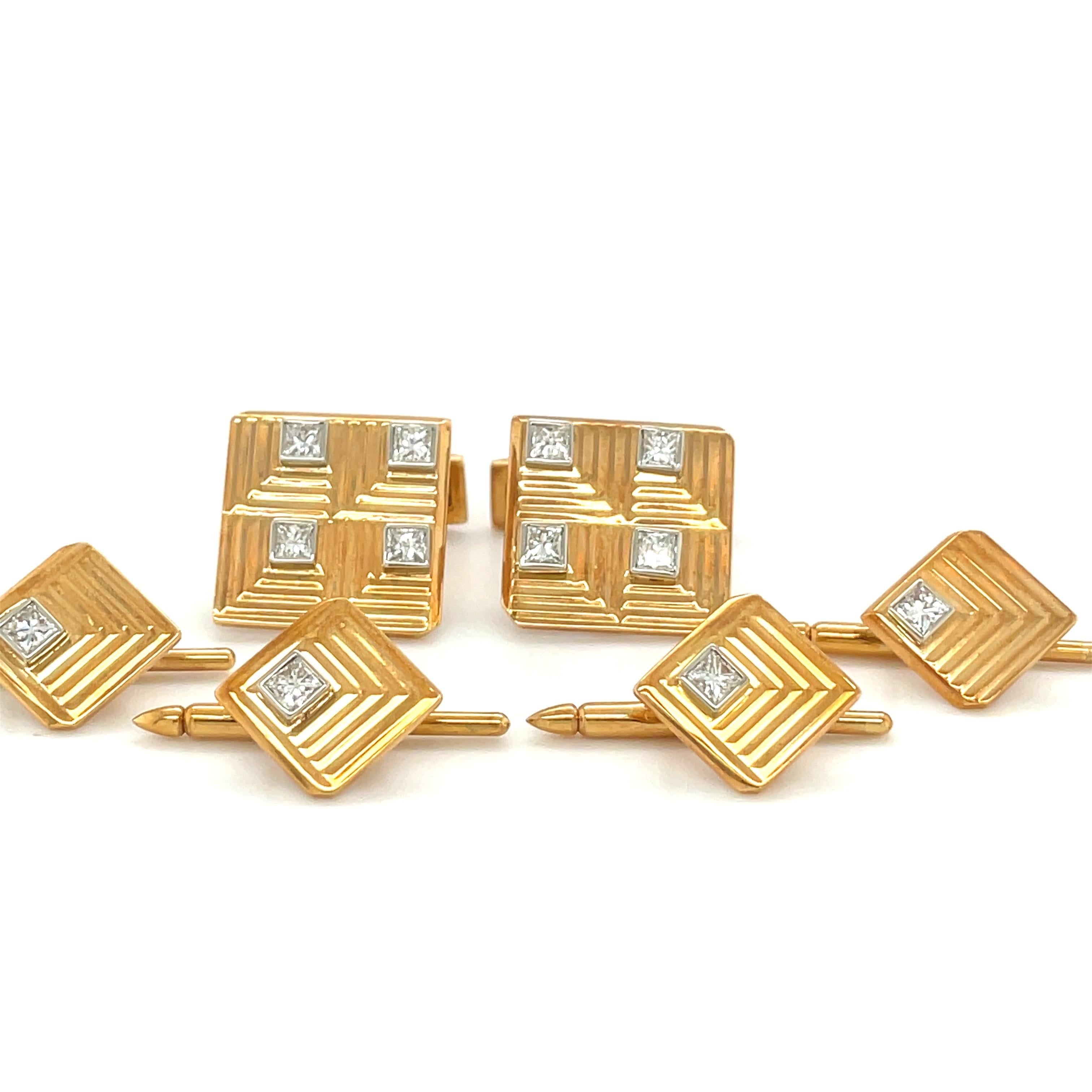 Class and charm for the connoisseur,  these Charles Gold & Co. 18 karat yellow  wing back gold cuff links and studs are a fabulous find. This dress set was crafted by master jewelers Charles Gold & Co., who  also manufactured jewelry for Van Cleef &
