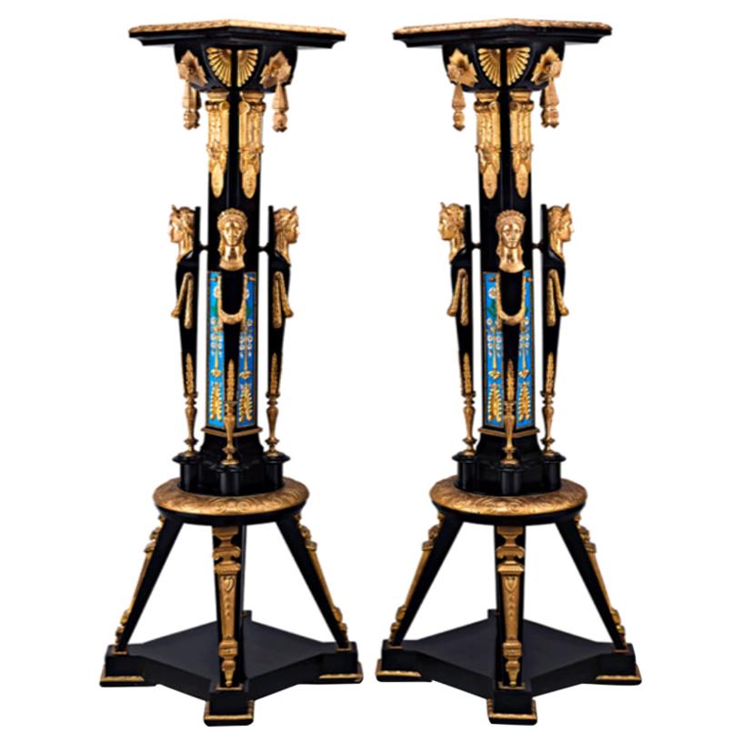 A highly important pair of Charles-Guillame Diehl and Jean Brandely Museum Quality Ormolu and Porcelain Mounted Ebony Neo-Grec Torchères / Pedestals circa 1870.

Majestic and exemplary of the masterpieces created especially for the International