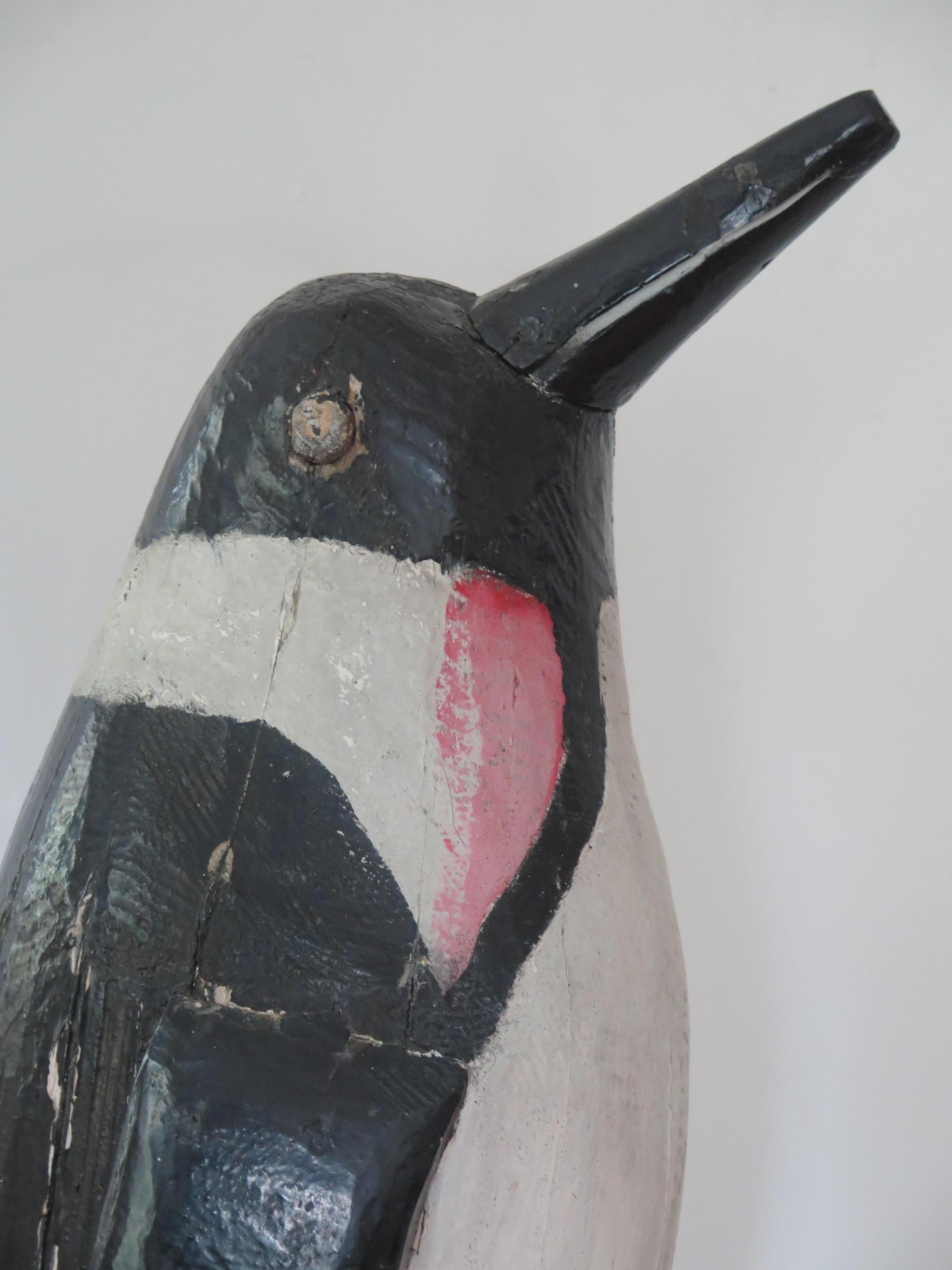 wood carved penguin