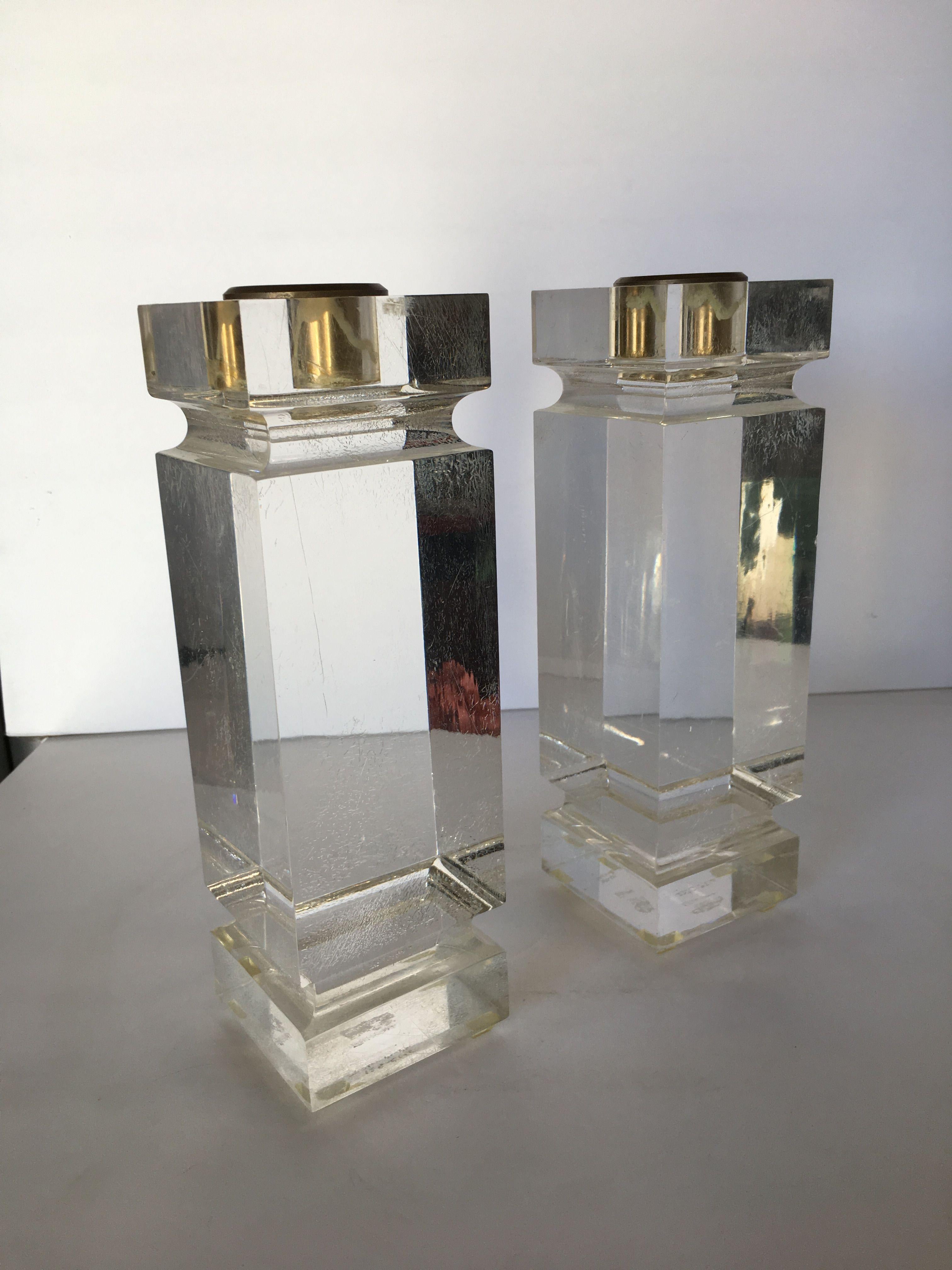 Pair of Charles Hollis Jones Lucite candle stick holder with bronze holder on top.