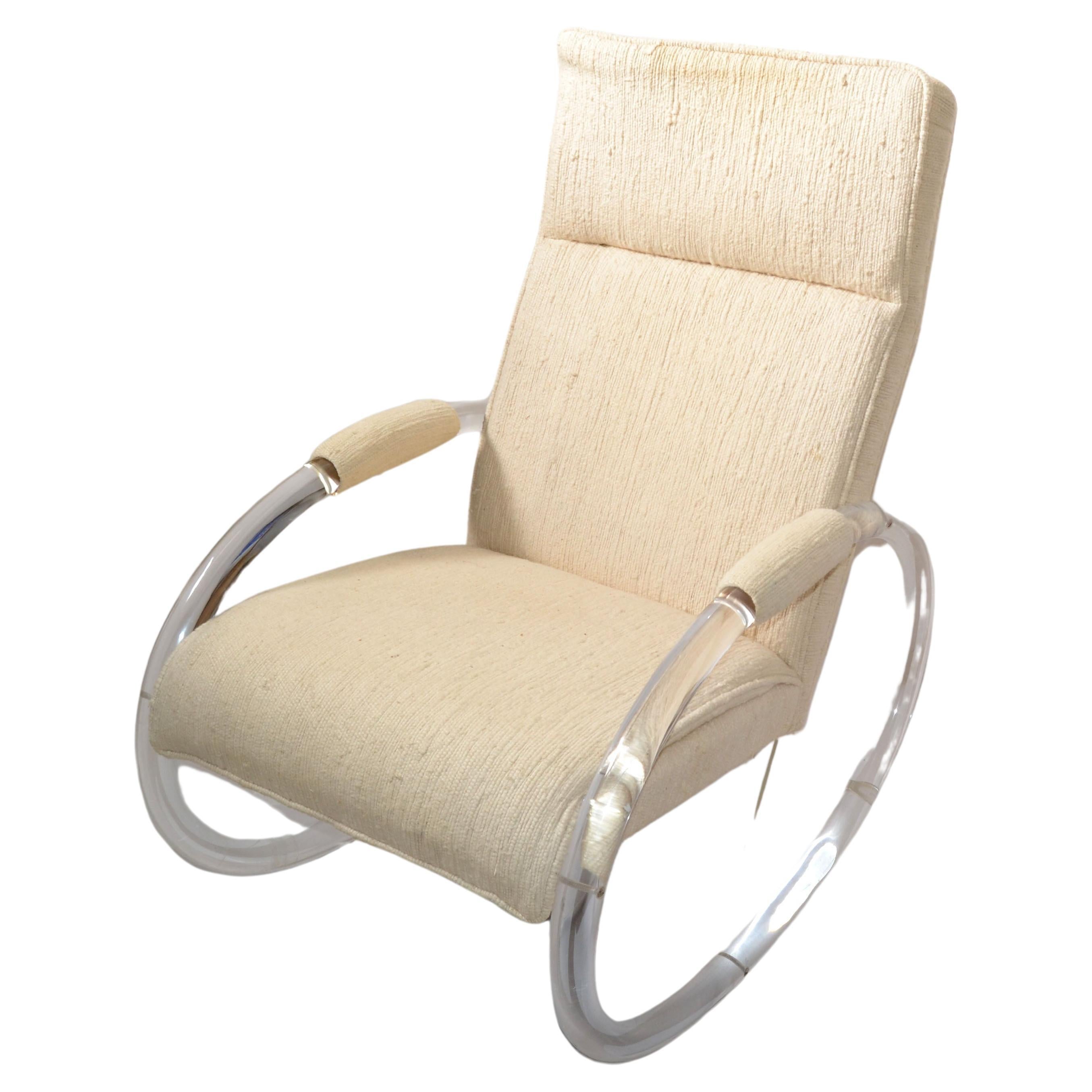 Mid-Century Modern bent Lucite and wood rocking chair designed by Charles Hollis Jones in the 1970s and made by Hill Manufacturing Corporation.
The Lounge Chair has the original beige Haitian Cotton upholstery.
Makers mark underneath.
Additional