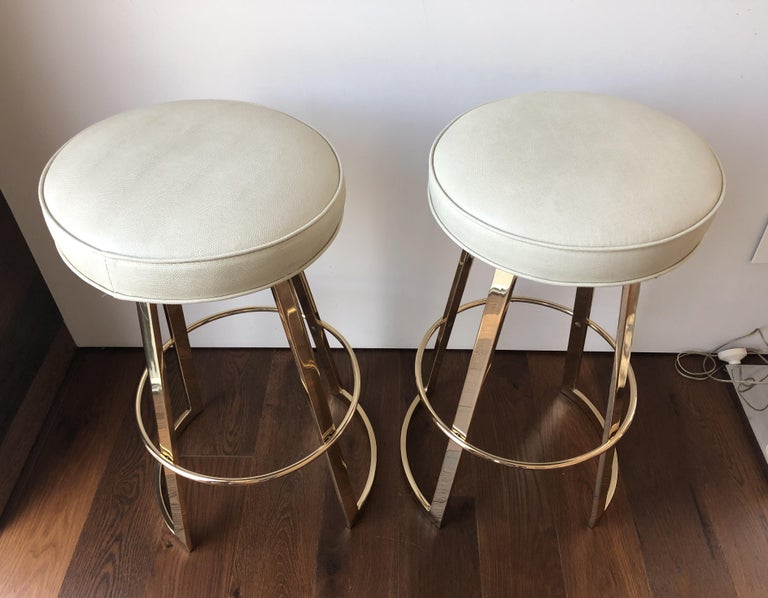 Charles Hollis Jones "Mathis" Swivel Bar Stools in Polished Brass For