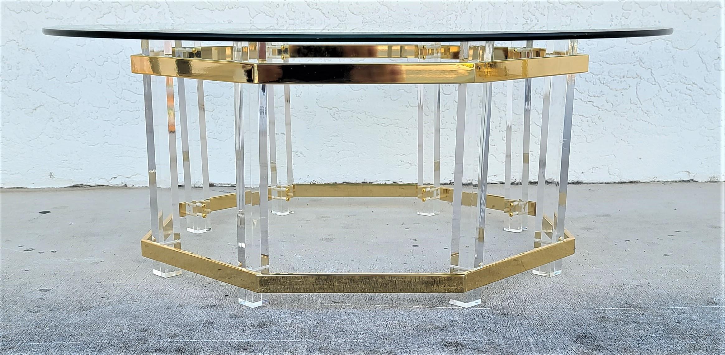 Offering One Of Our Recent Palm Beach Estate Fine Furniture Acquisitions Of A
Charles Hollis Jones Mid Century Brass Lucite & Glass Octagonal Coffee Table
With 42