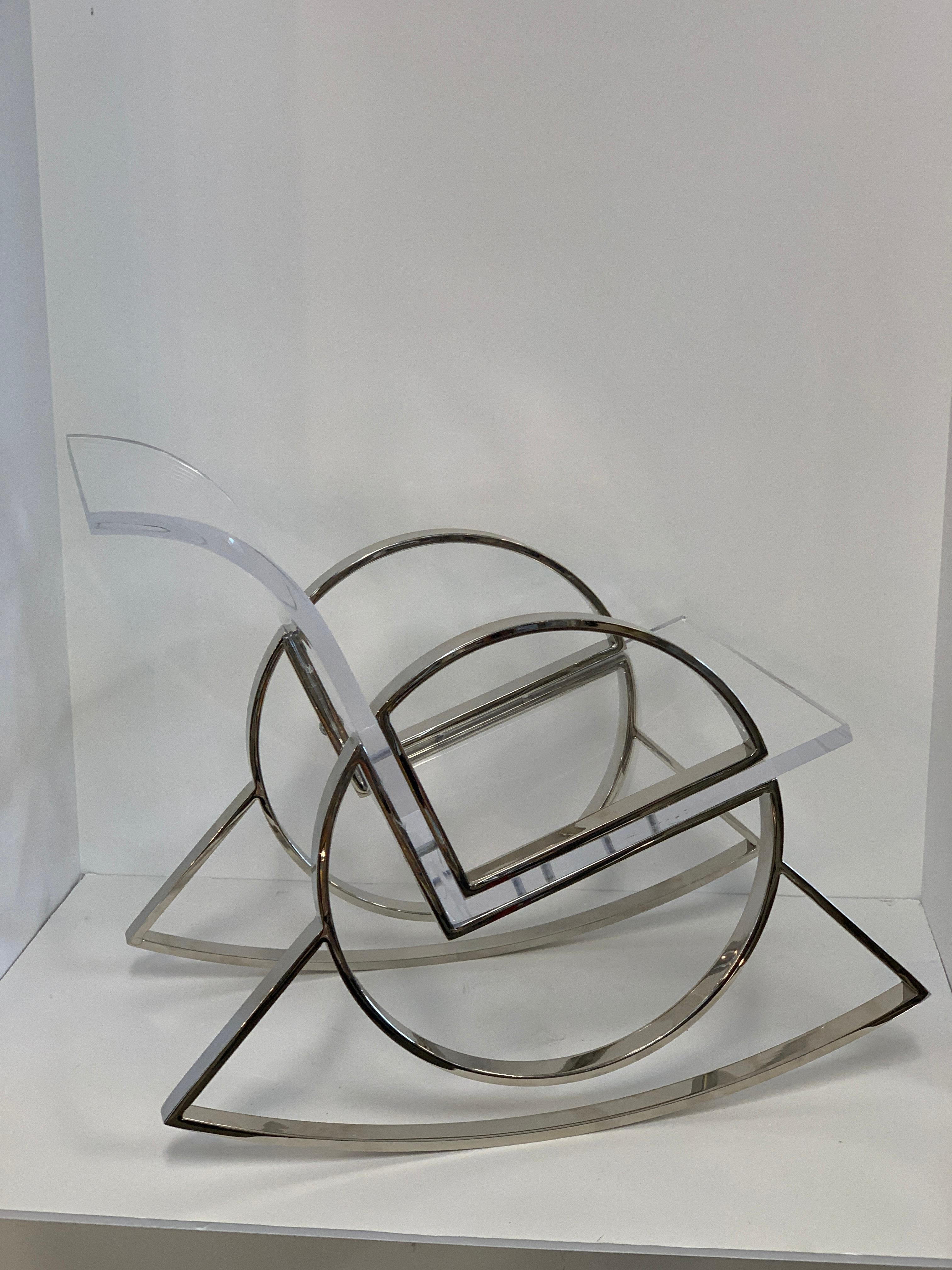 A wonderful miniature chair/rocker from his o line series, this piece by Charles Hollis Jones is as one of his first ventures into sculpture. The piece is diminutive in scale when compared to his full size rocker, which is listed separately. This