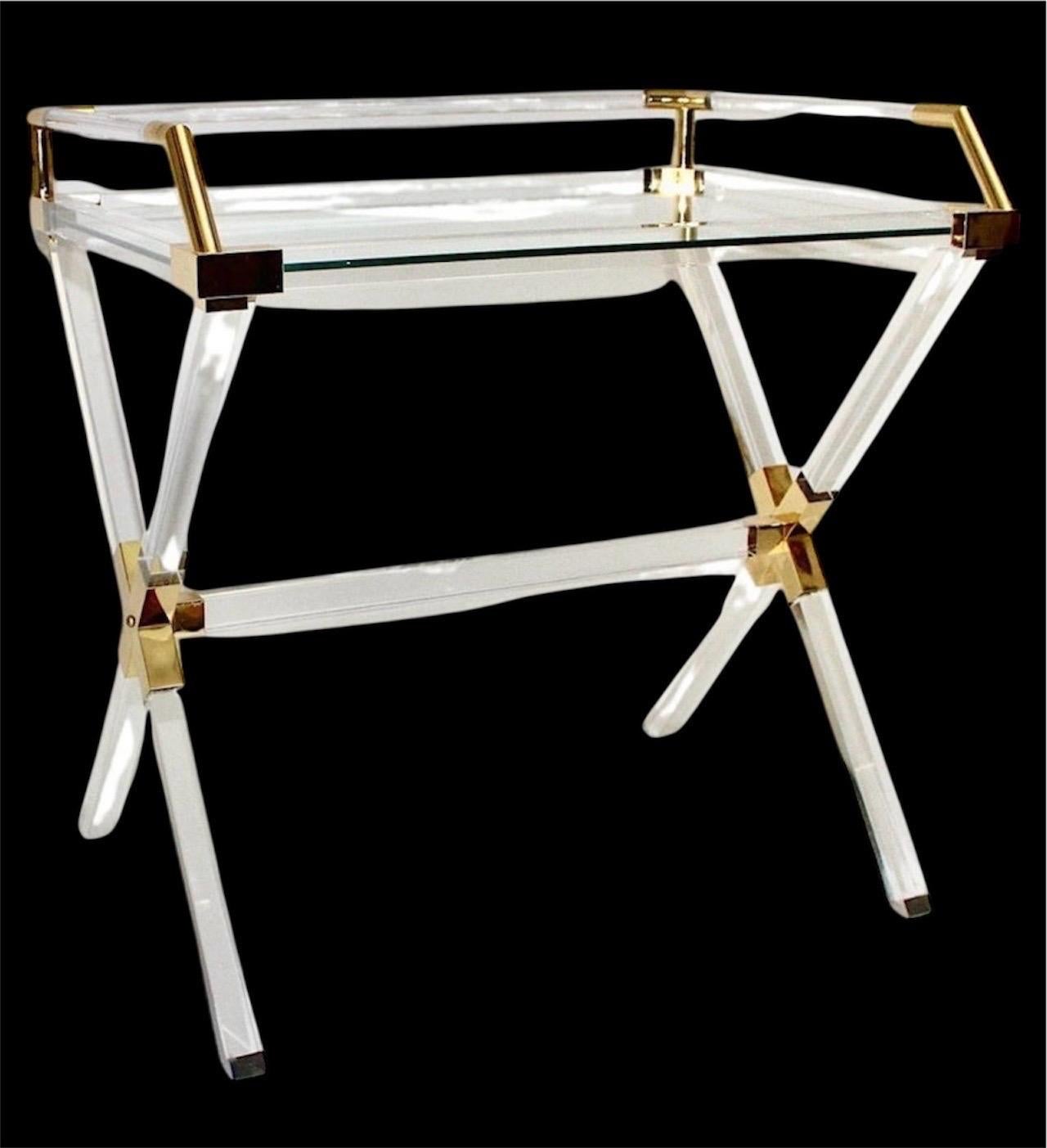 A Charles Hollis Jones plexiglass (Lucite) table is a sought-after acquisition for collectors and design enthusiasts due to its innovative craftsmanship, iconic style, and historical importance within mid-century and Hollywood Regency furniture