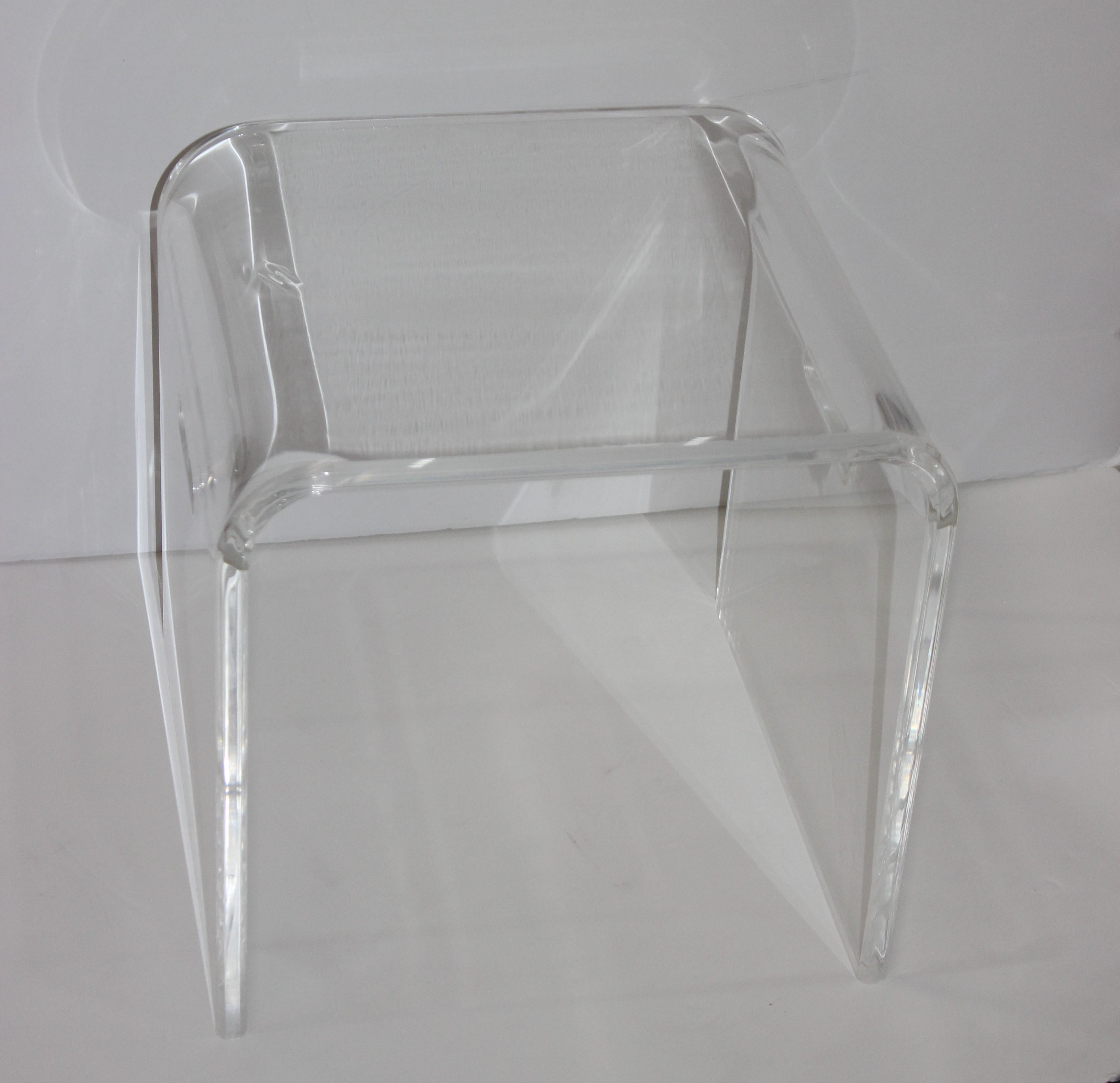This stylish 1970s Lucite 